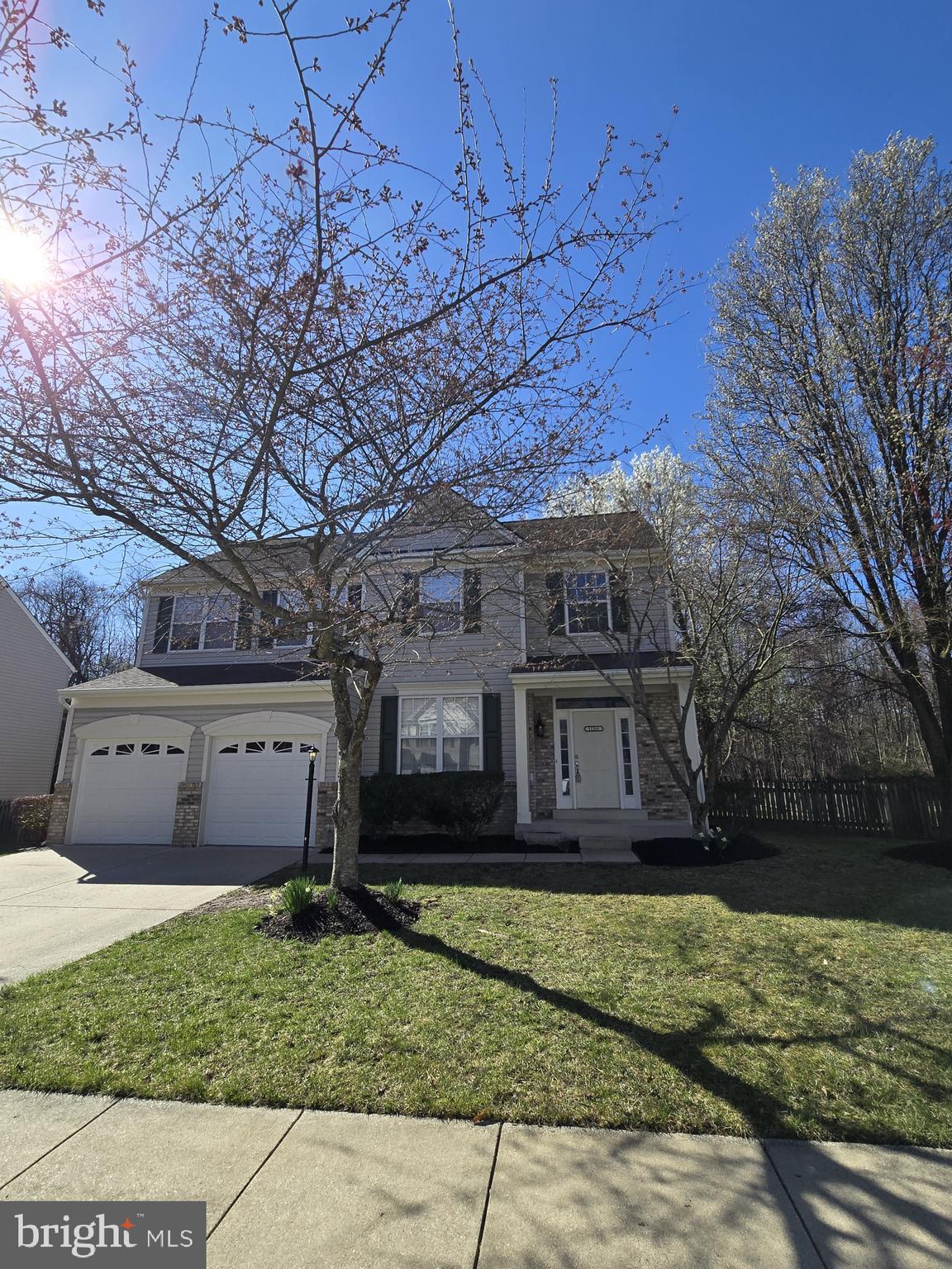 Welcome to your perfect new home located in the sought-after Waldorf neighborhood of Wexford Village. This spacious and well-maintained 4-bedroom, 2.5-bathroom house offers comfort, style, and convenience in one unbeatable package. Step inside to find an open and airy 2 story foyer.  Gleaming wood floors flow through the kitchen, family room, and living room, adding warmth and elegance to your everyday living spaces. The kitchen features beautiful granite countertops, sleek black appliances, and a gas stove, perfect for home chefs. The cozy family room opens to an enclosed porch/sunroom, ideal for enjoying your morning coffee or entertaining guests year-round. A deck is situated off of the enclosed porch as well.  Upstairs, the primary suite boasts two large walk-in closets and a private ensuite bath with a large soaking tub and separate shower. Carpeted bedrooms offer comfort and quiet, perfect for relaxation. Convenient upper-level laundry with washer & dryer.  Enjoy the outdoors in your fully fenced backyard, complete with a storage shed for all your gardening and outdoor needs.  The backyard also backs up to the woods which adds additional privacy.  A spacious 2-car garage provides plenty of parking and storage. Easy commuting to DC and VA and less than a few minutes to local shops and restaurants.  Don't miss your chance to own this incredible home in a perfect location and well established community—move-in ready and waiting for you. Schedule your showing today.