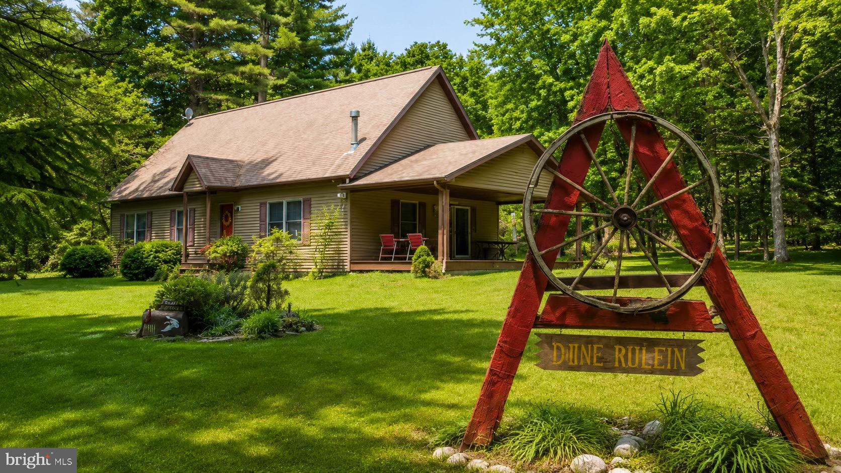 Nestled in the mountains along scenic Queens Run Road, this 1.5-story home offers a great opportunity for anyone looking for a full-time residence, hunting camp, or weekend getaway. Set on a .64-acre lot, the property provides a peaceful setting surrounded by the natural beauty and outdoor recreation that Clinton County is known for. The home features an attached garage, spacious living areas, forced-air heat, oil and propane fuel options, multi-tank hot water system, and access to natural gas, well water, cable TV, and satellite service. Whether you're an avid hunter, fisherman, hiker, ATV rider, or simply enjoy spending time outdoors, you'll appreciate the property's proximity to state lands and endless opportunities for adventure. Enjoy the quiet mountain setting while still being within a reasonable drive of Lock Haven and everyday conveniences. A great base camp for outdoor enthusiasts or a comfortable place to call home year-round. There is a gate to the drive way so please schedule showings if you are interested in taking a look