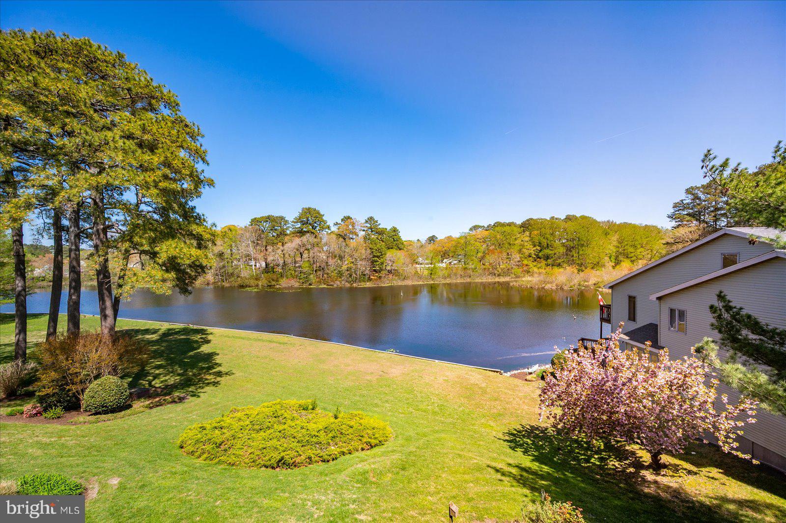 Welcome to one of the most desirable opportunities in Salisbury. Opportunities like this rarely become available, and when they do, they do not last. This is one of them. Located in Canal Woods III, this third floor three bedroom, two bathroom condo combines size, upgrades, and a water view in a way few units can match. Unit #301 sits within the premium stack of the building, a position shared only with #101, #201, and #401. These units offer the largest square footage in Canal Woods III, giving you space that no other stack can. Positioned on the third floor, this condo overlooks the pond below, creating a setting that feels private and removed while still being minutes from everything Salisbury has to offer. Properties that combine this level of space with a water view are limited, and buyers recognize that immediately. Unit #301 has been completely remodeled, removing the need for updates or improvements. The next owner can step in and enjoy a finished product from day one. The kitchen features newly painted cabinetry with updated hardware, a tile backsplash, and durable LVP flooring. Brand new appliances including a refrigerator, electric stove, and dishwasher complete the space. Nothing has been left undone. The main living area is where this unit separates itself. The additional square footage from the premium stack is felt right away, creating a space that is open, functional, and comfortable in a way most units in the building simply are not. Two large glass slider doors bring in steady natural light and frame the pond view. These are the details buyers notice first, and remember. New high end carpeting runs throughout the living areas and bedrooms, and the entire unit has been freshly painted. Updated lighting, outlets, and switches complete the interior, leaving no unfinished work behind. With three true bedrooms and two full bathrooms, this layout provides a level of flexibility that is increasingly difficult to find in this price point. Canal Woods III is located just south of Salisbury University with quick access to Route 13. Shopping, dining, and daily conveniences are all within minutes, while the community itself maintains a quiet, residential feel. The building offers a secured code access lobby and elevator access for convenience. Unit #301 is not just another renovated condo. It is a premium positioned unit with the largest layout in the building and a water view that very few others can offer. Opportunities like this are limited, and buyers who understand the value do not hesitate. If you have been waiting for the right property to come along, this is the one that makes you move.
