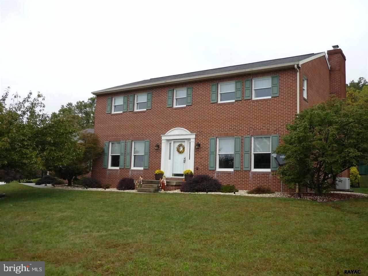 Gorgeous 2 story all brick colonial in Central Schools. 4 bedroom 2 1/2 bath on a large corner lot that backs up to the woods. Completely remodeled kitchen, large finished basement, gas burning fireplace, huge master suite...what else could you possibly need.