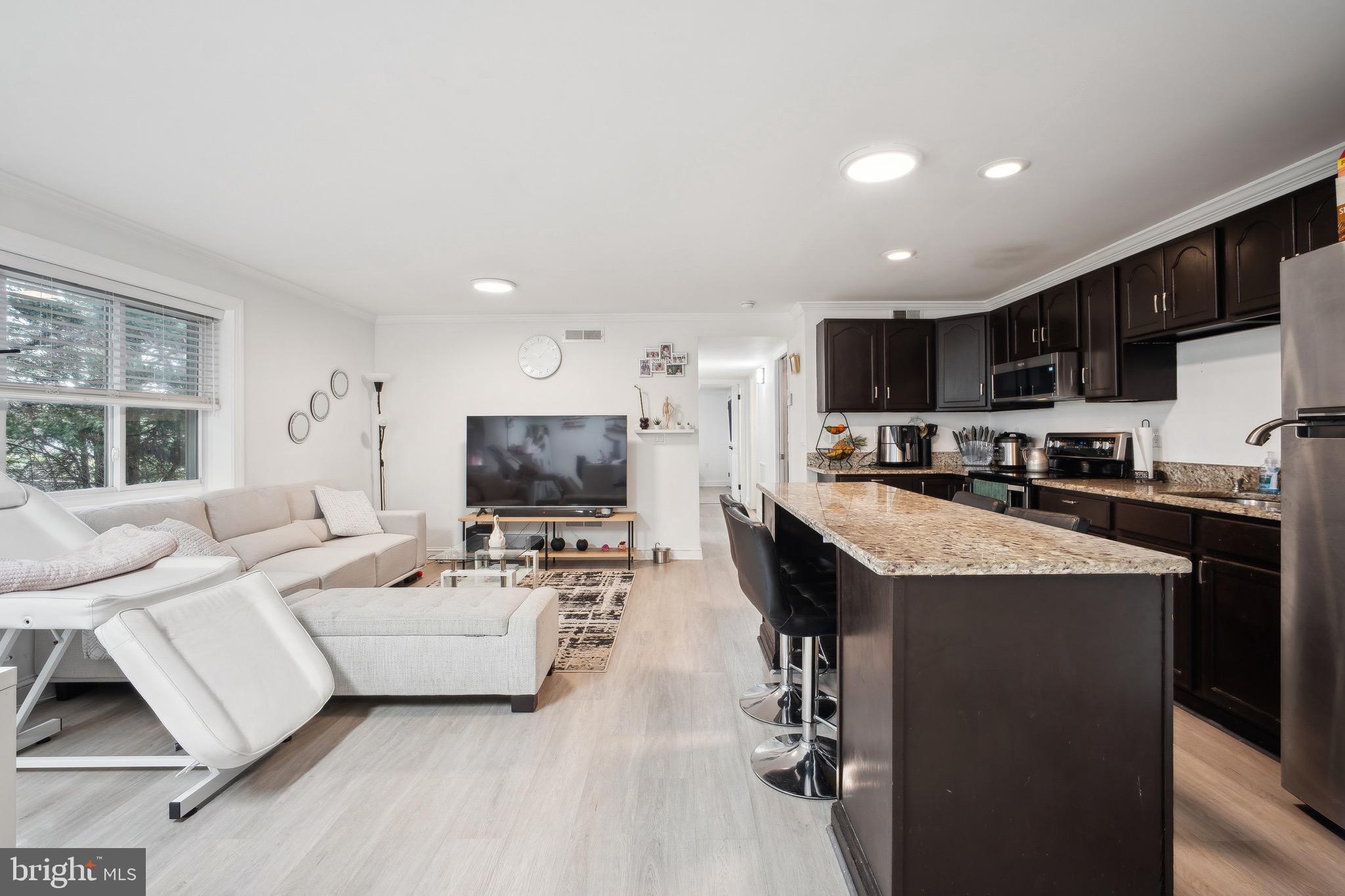 Modern, Stylish, & Move-In Ready!

Step into this beautifully updated 2-bedroom unit, where modern finishes meet everyday convenience. The full kitchen renovation (2016) creates an inviting open-concept layout, perfect for entertaining. Brand-new luxury vinyl plank flooring (January 2024) adds a sleek touch, complemented by custom blinds that are both stylish and energy-efficient.

This unit boasts a brand-new fridge and dryer, plus an in-unit washer (2010) and water heater (4 years old) for added convenience. The HVAC system (6 years old) and remodeled bathroom (7 years old) ensure comfort and efficiency year-round.

You'll love the assigned parking space, plus an additional permit-only parking pass. The community offers well-maintained grounds, ample parking, and easy access to public transportation, making commuting a breeze. Conveniently located near shopping centers and I-270, everything you need is just minutes away.

Owner-occupants only per condominium guidelines (rental waitlist available). Don't miss this opportunity to own a turnkey home with thoughtful upgrades throughout!