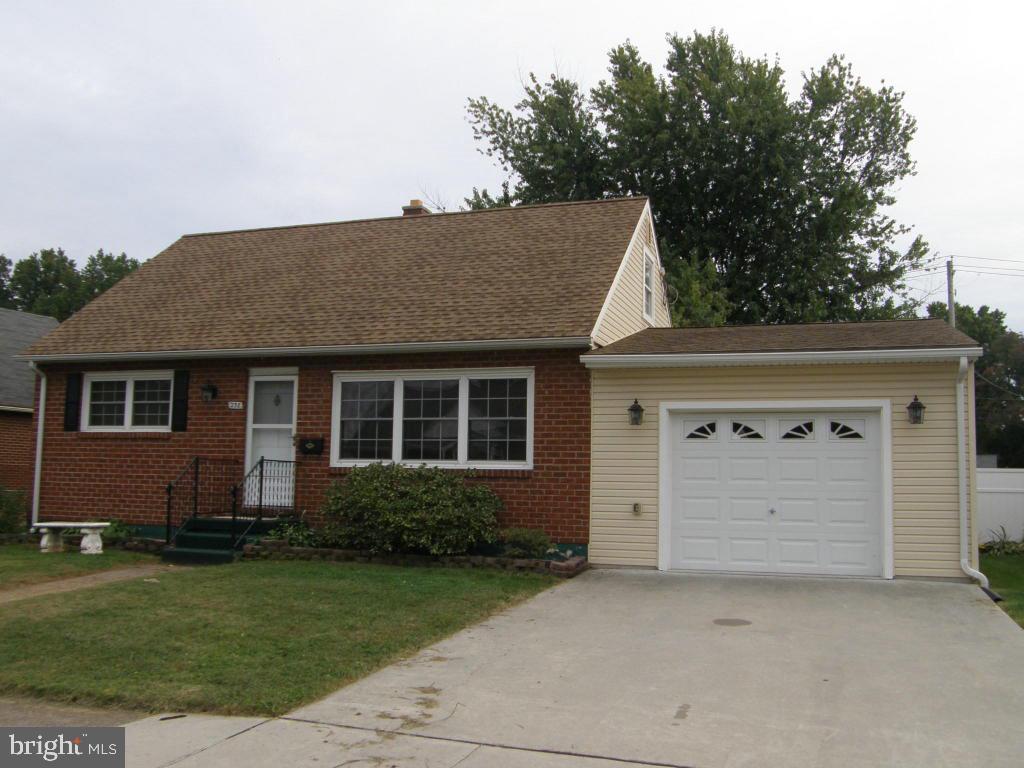 Come home to this well maintained brick 1.5 story home. Roof installed 2007, Heat & A/C 2008, added over sized garage with work area 2008. New carpet with hardwood underneath. Just move in and unpack! Added bonus of 13x26 family room in basement & fenced rear yard with patio