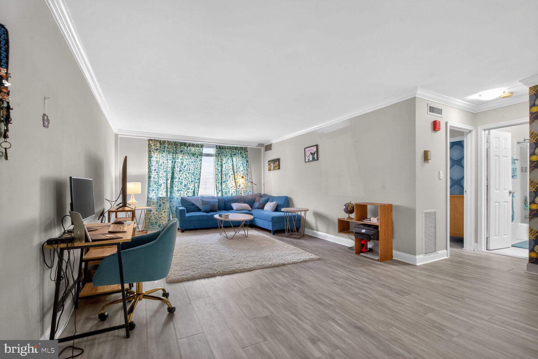 Price reduced!  Enter to style, space and light with this elegant condo with a very desirable floor plan in The Whitehall Condominium. A renovated lobby with concierge welcomes you to the building. Recently renovated, the condo features modern flooring, elegant crown molding, and expansive picture windows that flood the space with natural light.   Enter the unit to a large double door coat closet.  The open floor plan has a spacious Living Room/Dining Room combination, perfect for modern living. A newer kitchen features ample white cabinetry and lighting that adds to the kitchen’s ambiance. Updates include a renovated bathroom with ceramic tile, sink with vanity with granite countertop.   The bedroom is large enough for a king bed, desk and additional furniture.  Although it is a first-floor unit, it sits well above the ground.   Amenities include an outdoor swimming pool, sunning spaces, a club house, Bar B Que and a fitness center. The unit comes with two assigned parking spaces. Invite guests - there are plenty of guest parking behind the building, very rare in Bethesda! The monthly condo fee includes all utilities (except internet). The Bethesda Metro, shopping and dining at all of the stores and many restaurants that Bethesda has to offer are blocks from your door.