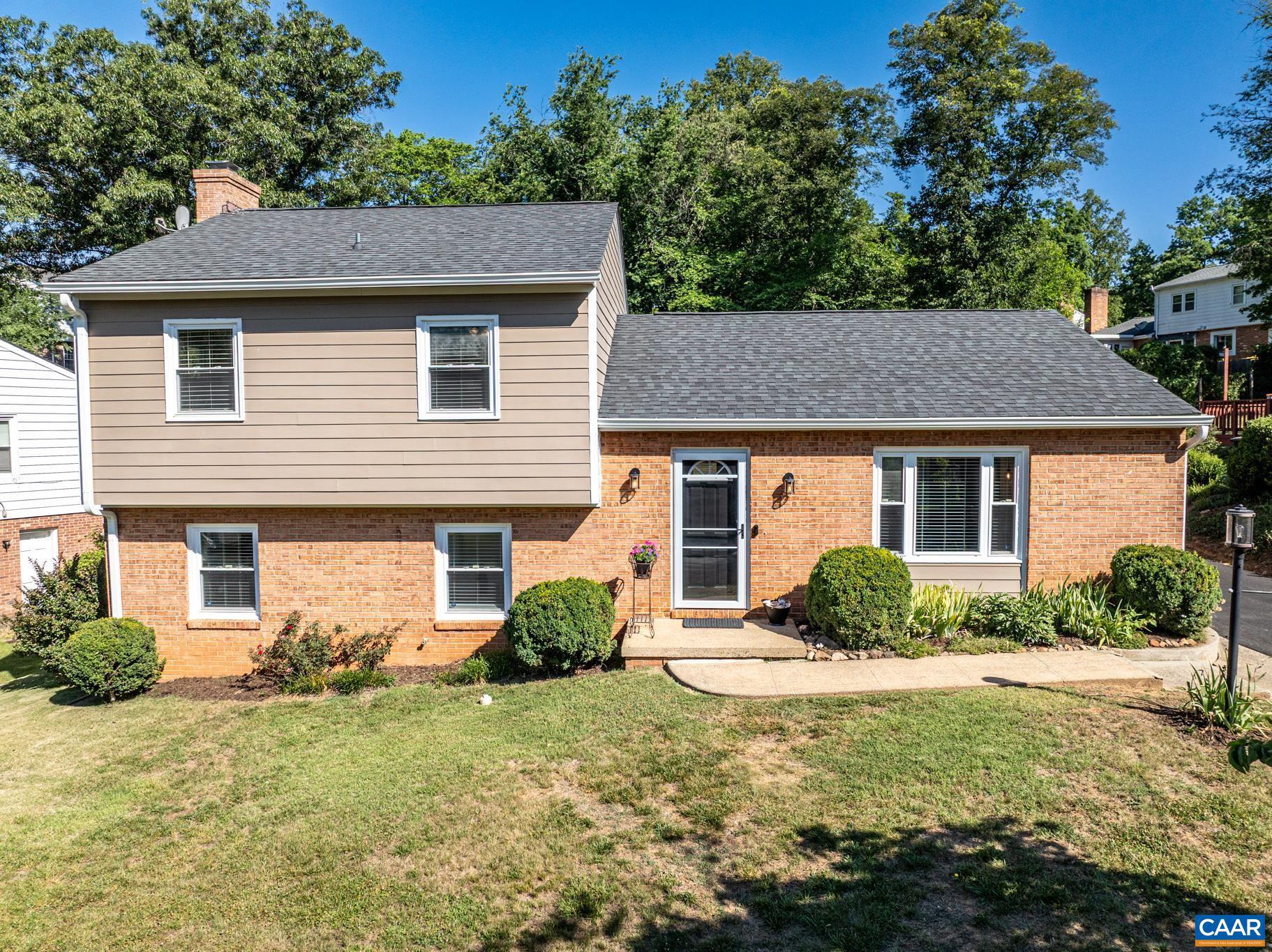 Welcome to 327 Brentwood Road.  This charming split level home is nestled in the desirable Woodbrook neighborhood.  This well maintained, move-in ready, and light filled home has 3 bedrooms and  2 1/2 baths.    The main floor has a living room, large kitchen with ample custom kitchen cabinets, a breakfast nook, and a peninsula that opens up to the dining room. The second floor is comprised of all three bedrooms and two full baths. The lower level is made up of a half bath, laundry room and a spacious family room with a wall of built ins. The family room has a pellet stove that heats the whole house and helps to keep winter heating bills low. Updates include Hardie plank siding, flooring, crown molding, and interior and exterior paint.  A newly paved driveway leads to a large shed, providing lots of room for tools, outdoor equipment, or hobby space.    Woodbrook is known for its vibrant sense of community with neighbors enjoying walks, runs, and stroller-friendly streets.  The elementary school is conveniently located within the neighborhood.  Woodbrook is just minutes from the airport, shopping, dining, UVA, and NGIC.  This home is the perfect combination of comfort, convenience, and community living without any HOA fees.,Oak Cabinets,Fireplace in Basement