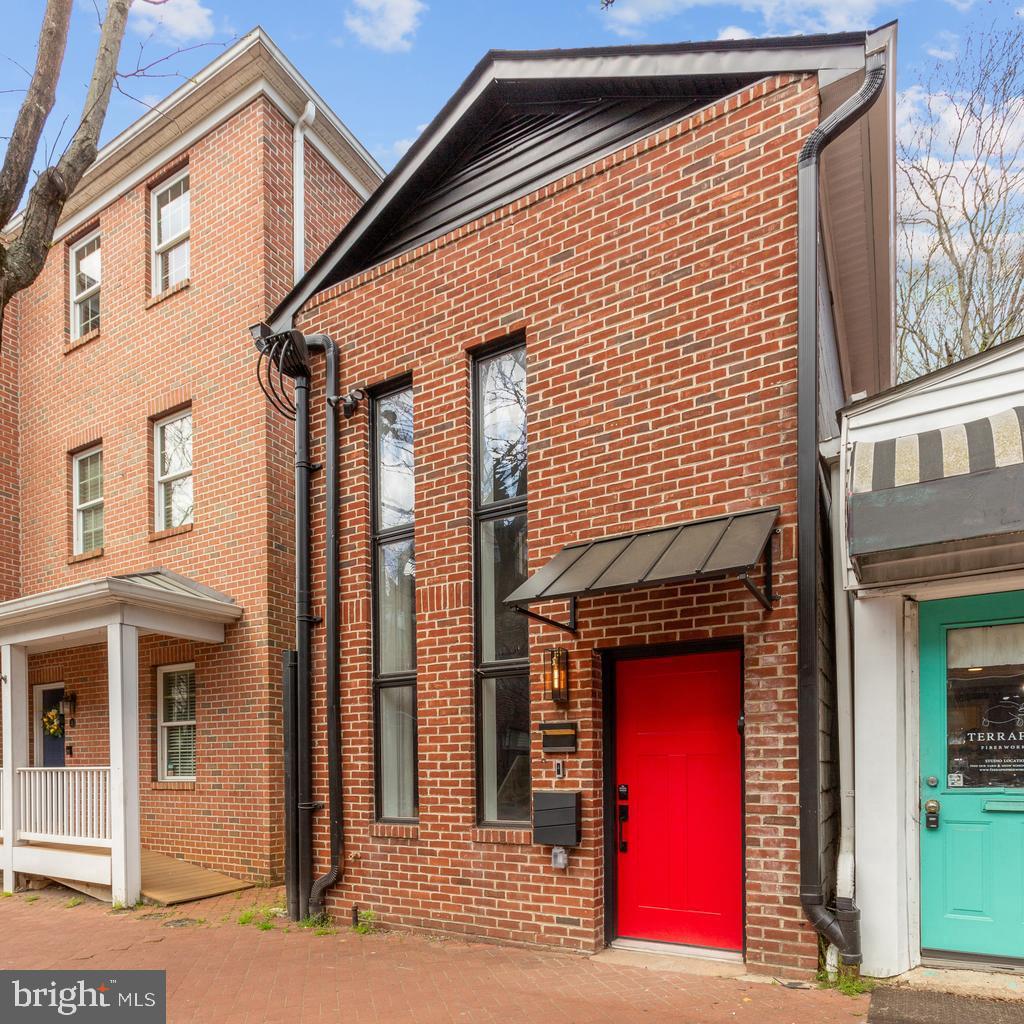 Welcome to 220 West Street in Annapolis, Maryland. A rare, fully gut-renovated detached property located in the heart of the Downtown Arts District at a row home's price, offering exceptional flexibility with mixed-use zoning that allows for both residential and commercial use.

Completed in 2024, this property has been completely transformed from top to bottom. Every major system and finish has been replaced, delivering a true turnkey opportunity for buyers seeking lifestyle, investment potential, or business use in one of the most walkable and desirable areas in Annapolis.

Unlike the majority of Downtown Annapolis properties, this is a fully detached home, not a rowhome or townhouse, providing enhanced privacy, natural light, and a more versatile footprint.

The extensive renovation includes a brand new roof, all new electrical and plumbing systems, a new high-efficiency mini-split HVAC system, redesigned floor plan, new flooring throughout, updated lighting, and fully rebuilt kitchen and bathrooms. The outdoor spaces have been completely upgraded with a new deck, new brick patio pavers, new fencing, and ambient lighting that creates a warm and inviting atmosphere for evening entertaining.

Inside, the home features a bright two-story entry foyer and a professionally curated interior design that blends modern comfort with intentional functionality. With three bedrooms and two full bathrooms, the layout is flexible enough to support full-time living, guest accommodations, workspace needs, or commercial adaptation.

The main-level primary suite opens directly to a private brick patio, while the second bedroom features access to a rear deck overlooking the fully fenced yard. These indoor-outdoor connections are rarely found in Downtown Annapolis and significantly enhance livability.

The kitchen has been completely reimagined with new cabinetry, countertops, and appliances, designed to support both daily living and entertaining. The open dining area comfortably accommodates gatherings, reinforcing the home’s versatility.

Adding even more value, this property is being sold fully furnished. Every piece has been professionally selected, allowing the next owner to move in immediately, operate as a short-term rental, or transition into a commercial or mixed-use setup with minimal effort.

Historically, this property has served multiple purposes, including a furniture store, office space, and duplex residence, highlighting the true flexibility and long-term value of its mixed-use zoning designation.

Step outside into a fully fenced private yard featuring a brick patio, outdoor dining area, lounge seating, and ambient lighting, creating a unique urban retreat just steps from the energy of Downtown Annapolis.

Located just moments from restaurants, shops, nightlife, City Dock, the Maryland State House, and the U.S. Naval Academy, this property offers unmatched walkability and access. With convenient proximity to Baltimore, Washington D.C., and BWI Airport, it is equally appealing for commuters, investors, and second-home buyers.

This is more than a home. It is a rare, fully renovated, detached mixed-use opportunity in Downtown Annapolis where lifestyle, flexibility, and long-term value align.