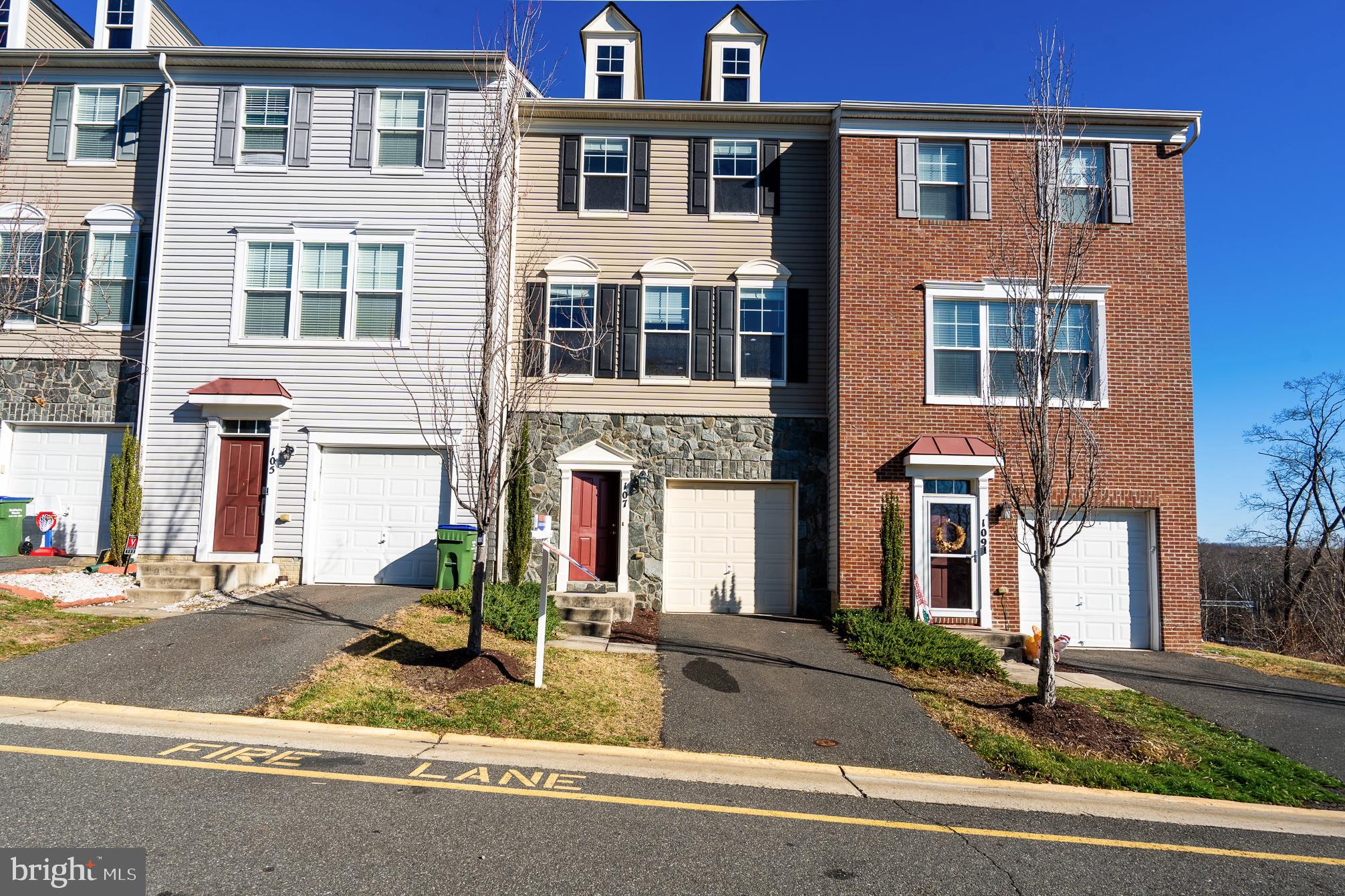 **Location, Location, Location!**
**New Roof Installed!**

Welcome to this stunning stone-front townhome in the highly sought-after Village at Woodstream, offering 2,252 square feet of beautifully designed living space across three finished levels. This home perfectly blends modern comfort, spacious living, and exceptional convenience—ideal for today’s lifestyle.
 **Property Overview**

* **Bedrooms:** 3
* **Bathrooms:** 3 Full, 1 Half
* **Style:** Three-Level Townhome
* **Community:** Village at Woodstream

 **Interior Features**

**Upper Level**
The spacious primary suite serves as a private retreat, featuring a sitting area, walk-in closet, and a luxurious en-suite bathroom with a soaking tub, separate walk-in shower, and dual vanities. Two additional bedrooms offer flexibility for family, guests, or a home office, along with a full hall bathroom. The conveniently located laundry room completes this level.

**Main Level**
Designed for both everyday living and entertaining, the open-concept main level features a large family room that flows seamlessly into the formal dining area. The kitchen offers ample space for cooking and gathering, while a powder room provides added convenience for guests.

**Lower Level**
The fully finished basement offers endless possibilities, complete with a full bathroom—perfect for a recreation room, home gym, media space, or private guest suite.

 **Community & Location Highlights**

* Close to a variety of shopping and dining options
* Easy access to commuter lots and Quantico Marine Corps Base
* Community amenities include a swimming pool, playground, basketball court, and scenic walking/jogging paths

 **Additional Feature**

* Tesla charger installed in the garage for added convenience

This exceptional home offers the perfect combination of space, comfort, and location—a rare opportunity you don’t want to miss!

🚫 **Please remove shoes or wear provided shoe covers when touring the home.**
.