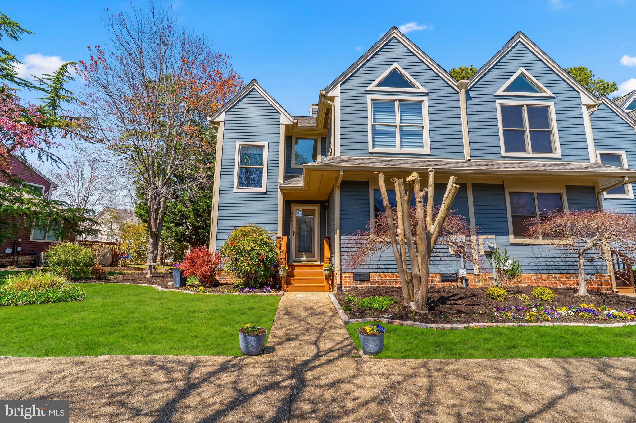 Experience an unmatched waterfront lifestyle in the prestigious community of Mill Creek in Solomons, MD. This exceptional end-unit town home offers the rare advantage of an expansive side yard AND a deeded boat slip (F-3) (approximately 30’ x 10’), that is perfect for enjoying relaxing days on the water. Thoughtfully transformed with a timeless design that features refined updates, finishes, light-filled rooms, this three-bedroom, three full bathroom home merges elegance with everyday comfort. Rich wood flooring flows seamlessly throughout both levels, setting the tone for the home’s elevated aesthetic. The kitchen is both striking and well-appointed, featuring custom-painted cabinetry, granite countertops, tiled backsplash, an induction range, Bosch dishwasher, trash compactor, and carefully curated details that make both cooking and entertaining a pleasure. The inviting family room centers around a warm propane fireplace, creating an intimate yet open gathering space. Upstairs, the primary suite offers a stunning private retreat, complete with a huge bedroom, dual closets and a beautifully renovated spa-inspired bathroom showcasing exquisite tile work and upscale finishes. An upstairs laundry room is both convenient and practical.  A floored attic for additional storage space. Outdoor living is equally impressive, with an expansive wrap around over-sized rear deck ideal for relaxing or hosting guests. It also includes a dedicated storage space. The lovely unique setting includes an expansive side yard complemented by open green space. Meticulously maintained with significant recent improvements, including stunning custom blinds upstairs (2025), a new roof (2025), encapsulated crawl space with dehumidifier (2025), new dishwasher (2025), HVAC system (2021), and water heater (2021), boasting both comfort and peace of mind. A water-front maintenance free community that includes exterior maintenance, lawn care, snow removal. Assigned parking and convenient guest spaces directly in front of the home. Every detail has been considered! A short commute to NAS Pax River. Just minutes away from the Calvert Marine Museum, restaurants, shops, the boardwalk and all the amenities Solomons Island offers. Don’t wait…Schedule the showing today!