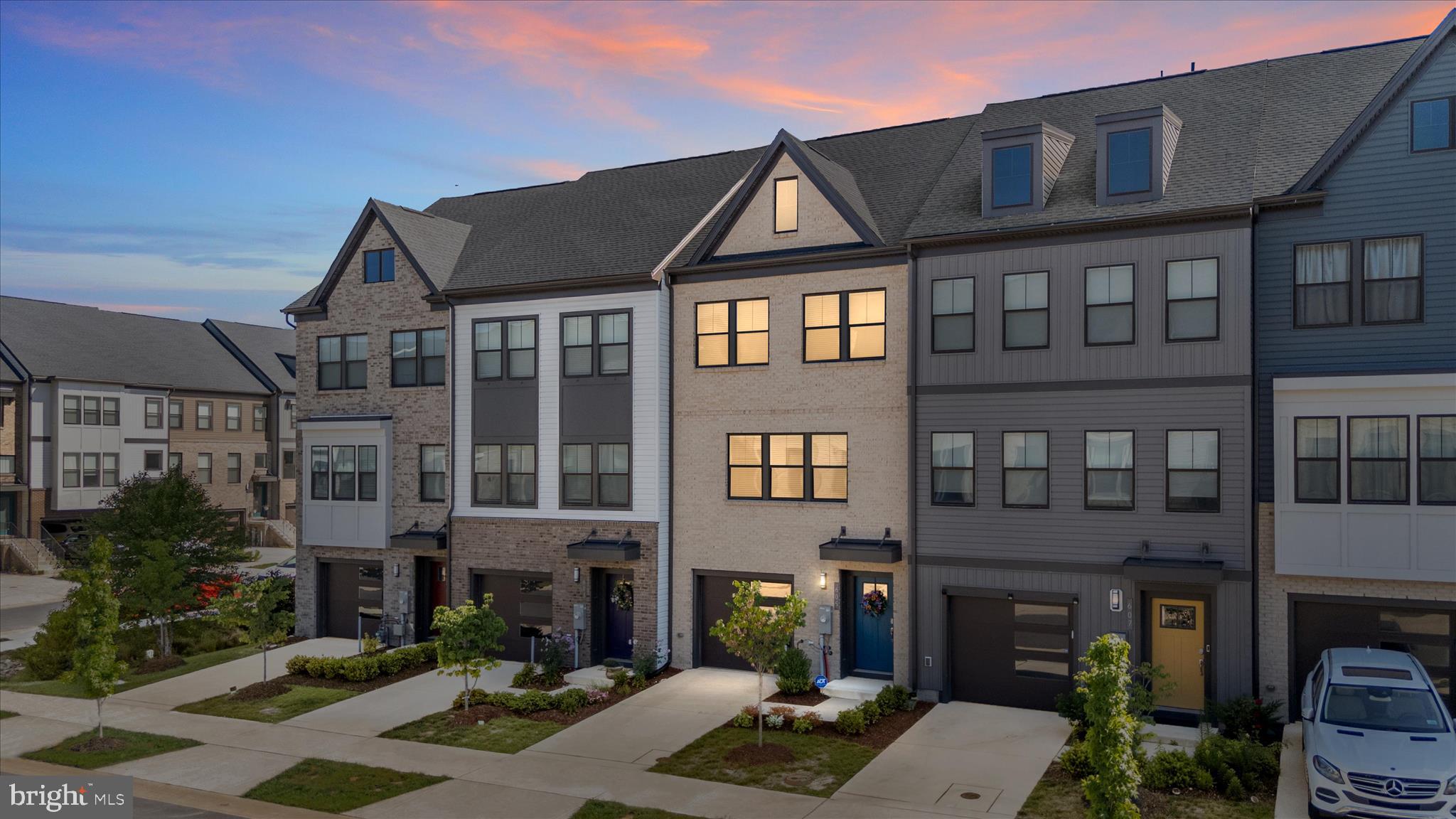 Welcome to 605 Lakemont Drive in the sought-after community of Tanyard Shores! If you’re looking for newer construction without the wait, this stunning 3-year-young home is the perfect opportunity. Showing like a model home, this beautifully maintained property offers approximately 2,200 square feet of finished living space across four fully finished levels. One of the larger single-car garage models in the neighborhood, this exceptional home is loaded with upgrades and thoughtful enhancements, including substantial bump-outs on three of the four levels and a finished fourth-level loft with private bath access and an expansive maintenance-free rooftop deck. The versatile floor plan includes 3 bedrooms and a bathroom on every level, with upper-level laundry for added convenience. The entry level features a spacious recreation room with a full bath and walk-out access to the rear yard — ideal for entertaining, a guest suite, home office, or additional living space. The main level showcases an open-concept design centered around a gourmet kitchen featuring a massive island, double ovens, gas cooktop, upgraded cabinetry, and abundant gathering space. The added bump-outs enhance the openness and natural flow throughout the home. The spacious living room opens to a maintenance-free deck, perfect for relaxing or entertaining. Upstairs, the third level offers three generously sized bedrooms, including a luxurious primary suite complete with a large walk-in closet and expansive private bath .The top-level loft provides incredible flexibility and includes a half bath and access to the rooftop deck. Whether used as a fourth bedroom, office, fitness area, or media room, this space is sure to impress. Residents of Tanyard Shores enjoy resort-style amenities including a community pool, clubhouse, fitness center, dog park, boat ramp, scenic walking trails, and more. furnishings may also be available for purchase — please contact the listing agent for details. Whether you’re buying your first home or making your next move, don’t miss the opportunity to own this exceptional home in one of the area’s most desirable communities!