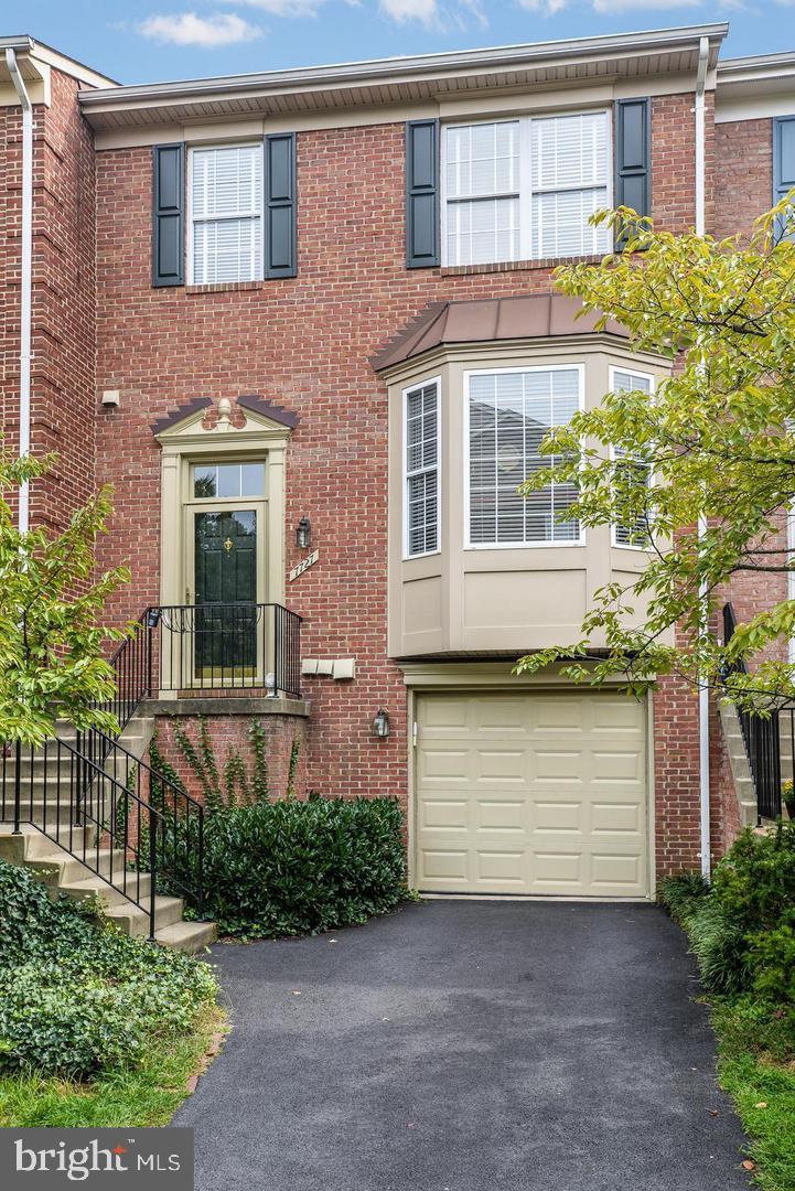 Welcome to this elegant brick front townhouse in sought after Kingstowne! This spacious home boasts gleaming hardwood floors on the main level  with an updated kitchen, quartz counters, island, breakfast nook and access to the deck overlooking the wooded common area.   The front bay windows allow plenty of natural light into the living space.  Upstairs you will find the primary bedroom with a sitting area, walk in closet, huge bathroom with soaking tub and double vanity sink.  Two bedrooms and full hall bath.  The lower level offers a large rec room with gas fireplace and walk out to the fenced, hardscaped rear yard/patio and access to the garage.
The home is conveniently located minutes to Ft. Belvoir and the US Coast Guard Navigation Center.  A short commute to I95/395, DC, the Pentagon and Crystal City.  The Kingstowne community has an abundance of restaurants, shopping, entertainment and many community amenities.  Springfield Metro Station is within two miles with parking available to make your commute easy and carefree.