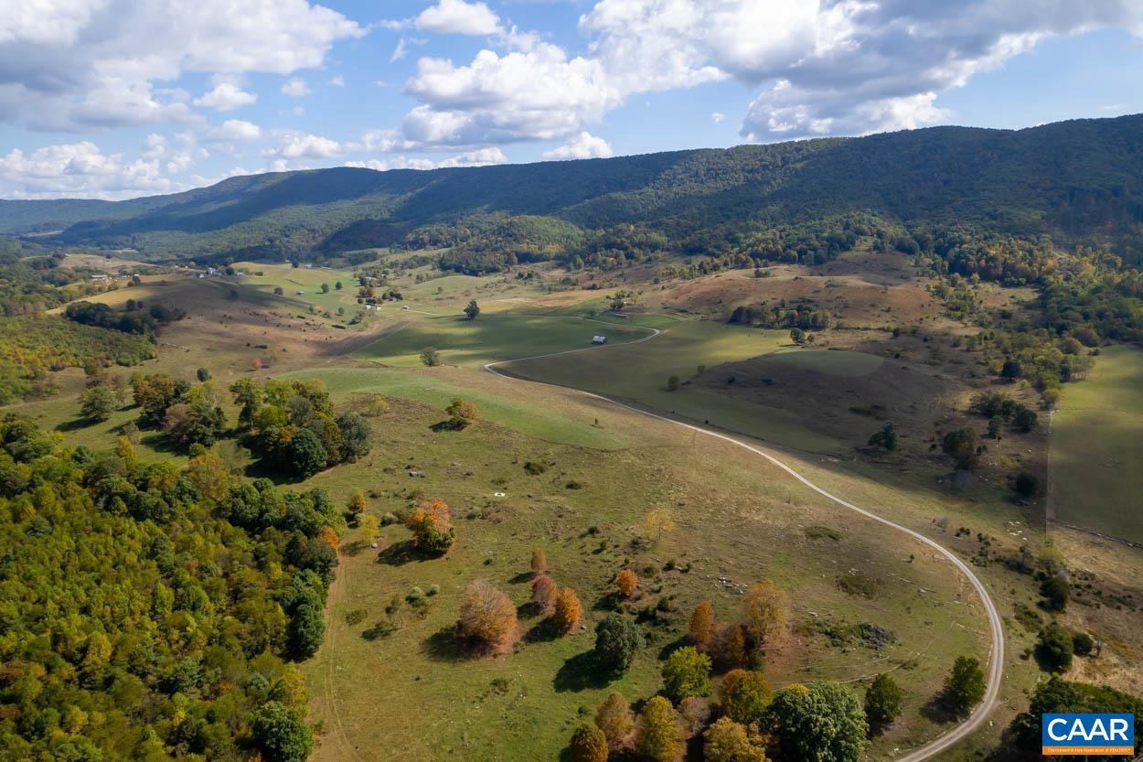Exceptional 586 acre cattle farm awaits its new owners. With rolling open pastures, mountain views, wooded areas for shade and potential timbering, this property is truly a cattle farmer's heaven. There is a 250-head Priefert Cattle Working System that was recently installed. Under current ownership there have been vast improvements: new woven wire fencing, a mile and half of improved gravel road and a recently renovated 3 bedroom, 3 bath brick home. The property is teeming with wildlife and offers fantastic hunting, and easy access to state maintained roads.  Only 1.5 hours from downtown Roanoke!