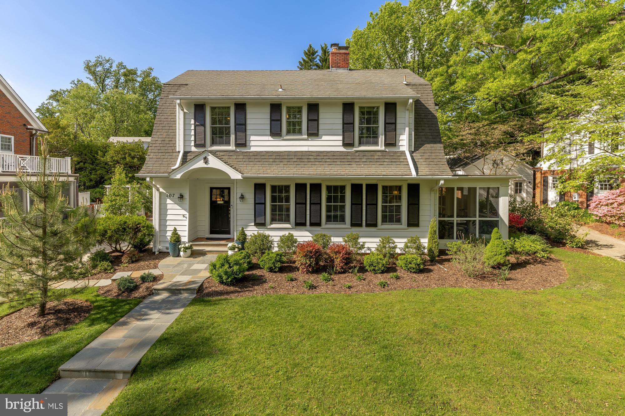 Ideally positioned on one of Chevy Chase Village's most coveted blocks, this beautifully expanded 1920s residence offers the rare combination of timeless character, thoughtful modern updates, and an address that is genuinely hard to come by. Chevy Chase Village is not just a neighborhood - it's one of the most established and sought after communities in the entire DMV, a tree-lined enclave of distinguished homes, wide sidewalks, and a genuine sense of place. Residents enjoy an extraordinary quality of life: twice-weekly trash and recycling pickup, a dedicated village police force, curated community events, and the kind of neighborly fabric that simply doesn't exist in most of metro DC. Zoned for Somerset Elementary, the location checks every box for discerning buyers.

Set on an elevated lot with a generous setback from the street, the home commands both privacy and presence - a gracious facade framed by mature landscaping and a fully fenced, flat backyard designed for everyday enjoyment and effortless entertaining. The setting feels like a retreat while remaining just moments from Friendship Heights, Downtown Bethesda, and multiple Metro access points, putting the best dining, shopping, and cultural offerings of the region within easy reach.

Inside, the main level is anchored by a spacious living room with fireplace and a large, gracious dining room - both flowing seamlessly onto a stunning screened porch with designer tile that functions as a true fourth-season room and natural extension of the living space. At the heart of the home, the expanded cook's kitchen is built for both serious function and easy gathering, featuring island seating, two sinks, dual ovens, gas cooking, and a sun-drenched breakfast and sitting area overlooking the backyard - the kind of space that becomes the natural center of daily life.

Upstairs, the primary suite is a genuine retreat: cathedral ceilings, multiple closets, and a spa-inspired ensuite bath with soaking tub, separate shower, and marble finishes. Two additional large bedrooms and a renovated hall bath with an oversized tiled shower and abundant natural light complete the floor, along with a walk-up attic offering serious flexibility - whether finished into a playroom, creative studio, meditation space, or simply preserved as exceptional storage.

The lower level delivers versatile, fully livable space with a large recreation room, custom built-ins, full bath, laundry, and a flexible bonus room suited for guests, a home office, or extended living arrangements.

Recent improvements - including new windows, refinished hardwood floors, fresh exterior paint, a dedicated gas line for grilling, and extensive professional landscaping - ensure the home is as move-in ready as it is move-in worthy. A detached garage rounds out the package with practical everyday convenience.

This is a rare opportunity to own a character-rich, exceptionally livable home in a neighborhood where properties of this caliber are seldom available and even more seldom leave.