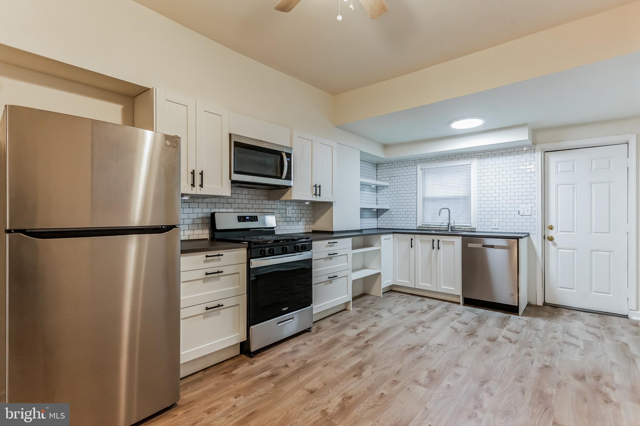 This updated three bedroom house spans over 1,100 square feet. Enter the lovely living room that features new luxury vinyl plank flooring and continue back into the updated eat in kitchen that has plenty of counter and cabinet space. There is a small backyard off of the kitchen. The second floor has three bedrooms all with luxury vinyl plank flooring. The updated bathroom features tiled flooring and sink/vanity. The unfinished basement has a washer/dryer already set up!  Conveniently located to public transportation as well as shopping and dining. tenant is responsible for all utilities. Pets are welcome.