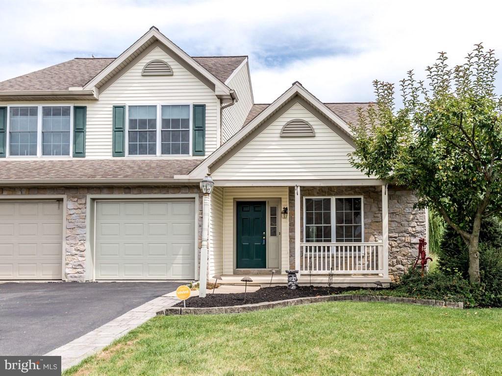 One of a kind duplex. First floor master bedroom, full bath & laundry. 3 bedrooms, bath & loft on second floor. Walk out basement features family room w-gas fireplace, full bath and a 12x15 workshop. Large deck & shed. over 2400 SF with finished basement. Amazing home! 1 car garage. No HOA fees!
