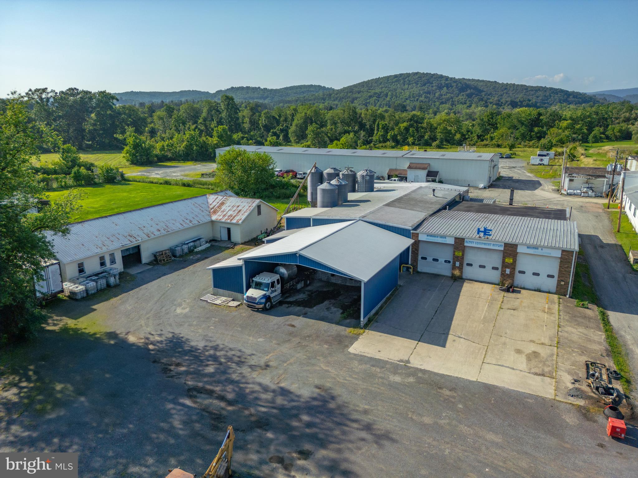 1.4 acres containing 2 commercial buildings totaling approximately 16,000 square feet, and (6) 25-ton grain bins. This parcel houses the business of Susquehanna Mills Co, which is a small-scale seed oil expelling business, started in 2006. The business is being sold turnkey with all equipment needed to resume operations. Lots of opportunity to take this profitable business to the next level.