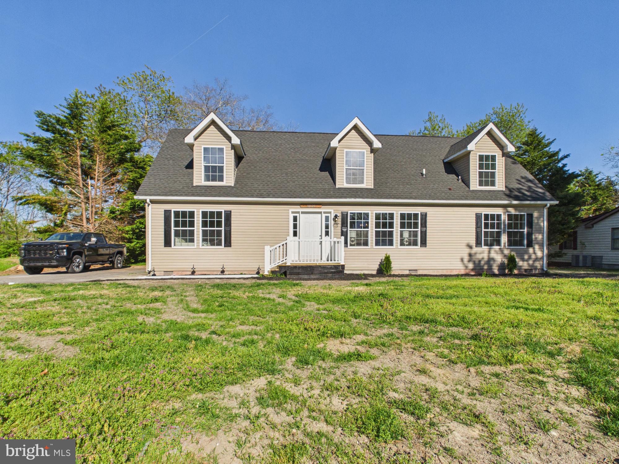 Nestled in Clarksville just 5 miles west of Bethany Beach. Renovated in 2026 with 2,280 sqft, new roof, huge deck, short drive to the beach, primary suite, and taxes under $800/ year. What more can you get for under 400k? Hidden Acres hosts this exquisite Cape Cod-style residence which offers a harmonious blend of luxury and comfort. With a major renovation completed in 2026, including new roof, every detail has been thoughtfully curated to elevate your living experience. Step inside to discover an inviting open floor plan that seamlessly connects the living, dining, and kitchen areas, perfect for both entertaining and everyday living. The gourmet kitchen boasts upgraded countertops and stainless steel appliances, including a double oven and built-in microwave, ensuring culinary excellence. Enjoy cozy meals at the breakfast bar or host gatherings in the spacious dining area, enhanced by modern lighting and elegant wood floors. Retreat to the primary suite, featuring a lavish bathroom with a soaking tub, walk-in shower, and ample closet space. Additional bedrooms provide versatility for guests or a home office, while the entry-level bedroom adds convenience. You are sure to be amazed by the great room that has be fully remastered with wall to wall, built in dormers, recessed lighting, separate heat source and water access to rough in an additional bathroom or wet bar. The possibilities are endless with the immense amount of space upstairs. Outside, the property shines with exterior lighting and a charming deck, ideal for al fresco dining or morning coffee. The home is set on a generous 0.27-acre lot, offers space for outdoor activities and relaxation. This home embodies an exclusive lifestyle, located in the Clarksville area which is just 5 miles outside of Bethany Beach.  The paved driveway which offers 3-4 car parking was just resealed for the new homeowners. Experience the perfect blend of modern luxury and timeless charm in this exceptional Hidden Acres residence. Call to schedule your private tour today. Listing agent has financial interest.
