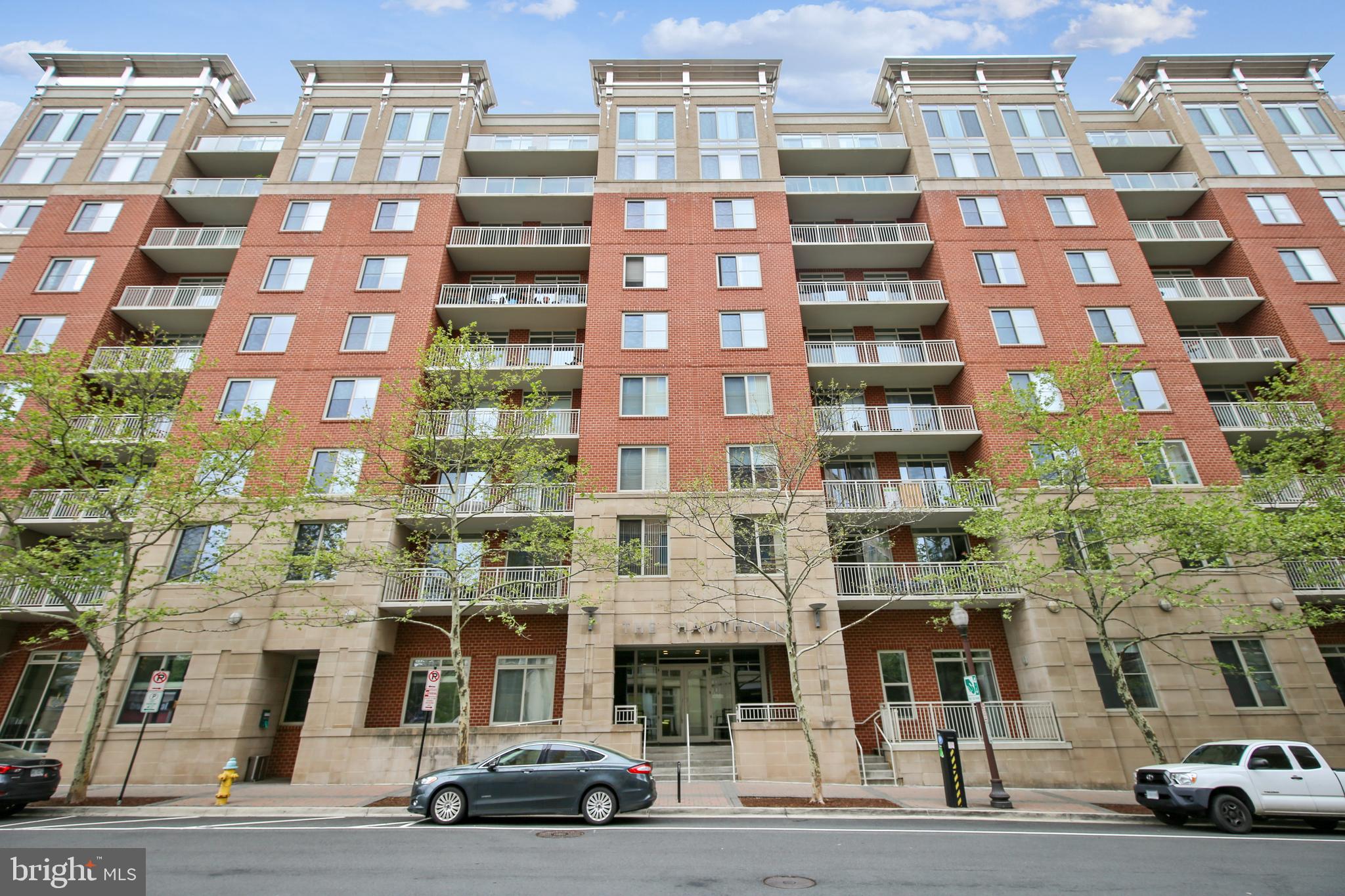 Application accepted - Open House cancelled .  Available  first week of July.  Spectacular corner unit of 1100 sq/ft overlooking an enclosed courtyard awaits  new tenants!  The Hawthorn is situated between two Orange Line Metro stations; Ballston and Virginia Square.  You'll enjoy all the amenities that the neighborhood offers - the Ballston Quarter mall, lots of restaurants and shops and proximity to major highways.  The community offers a fitness center, a business center and on-site management.   One garaged parking space is included.