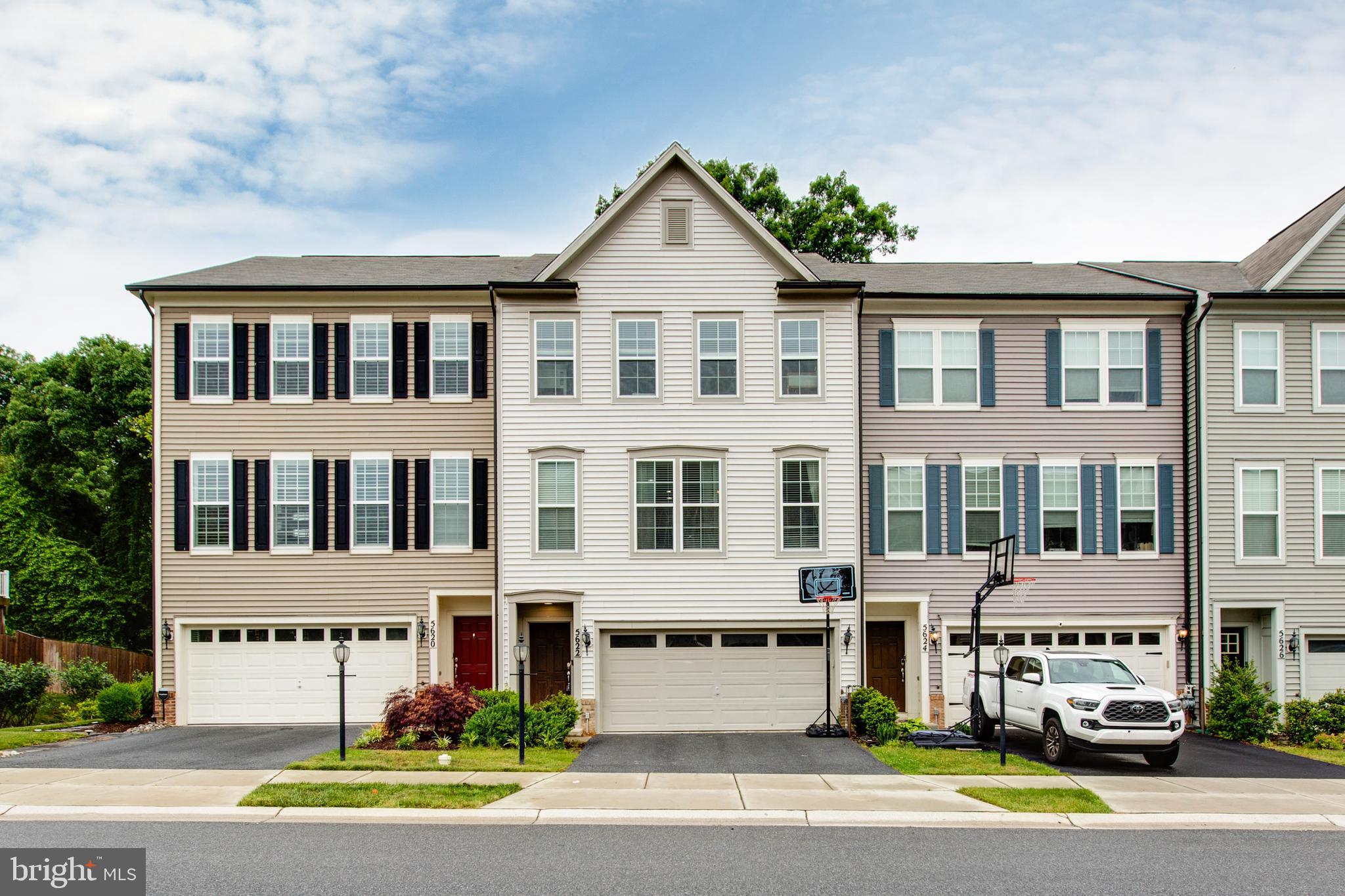 Welcome to this stunning, extra-large Parkvue model in the highly desirable Tallyn Ridge community! Showing like a model home, this property features extensive upgrades including hardwood flooring throughout the main level and a gourmet kitchen equipped with upgraded counters, a massive island, subway tile backsplash, and stainless steel appliances. The spacious living room, complete with a cozy gas fireplace and opens to a private deck overlooking serene woods. Retreat to the luxurious owner’s suite featuring a tray ceiling, walk-in closet, and a spa-like bath with a marble tile shower and double granite vanities. The finished lower level offers a large family room with a full bath and walk-out access to a fenced backyard and patio. Enjoy community amenities including a pool and walking paths that lead directly to Pinecliff Park. Located in the Oakdale school district, minutes from downtown Frederick and major commuter routes!