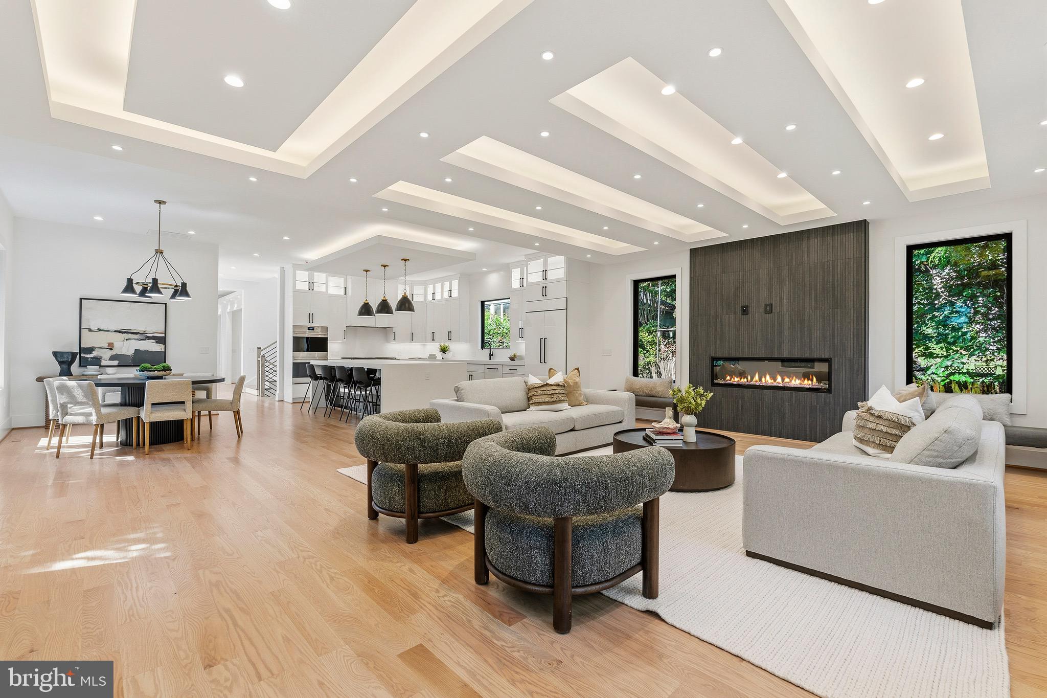 Welcome to this extraordinary newly built custom residence, completed in 2026 and offering  5,545 square feet of exceptional design, craftsmanship, and luxury in one of Arlington's most desirable locations. Thoughtfully designed with both elegance and functionality in mind, this 5-bedroom, 5 full and 1 half bath home delivers a seamless blend of sophisticated finishes and everyday comfort.
A light-filled open floor plan is enhanced by soaring ceilings, oversized windows, wide-plank hardwood flooring, and impeccable attention to detail throughout. Expansive living and entertaining spaces flow effortlessly from room to room, creating an inviting atmosphere for both intimate gatherings and large-scale entertaining.
At the heart of the home is a stunning gourmet kitchen featuring premium Wolf and Sub-Zero appliances, a Miele dishwasher, custom cabinetry, an oversized island, and designer finishes that elevate both form and function.
Every bedroom has been thoughtfully designed as a private suite, complete with its own full bathroom and spacious walk-in closet. The luxurious primary suite offers a peaceful retreat with a private balcony, spa-inspired bath, and an extraordinary custom walk-in closet. A beautifully appointed upper-level laundry room with abundant cabinetry, utility sink, and natural light adds convenience to everyday living.
The finished lower level offers exceptional flexibility with a spacious recreation room, custom wet bar, private bedroom, and full bath, making it ideal for guests, multigenerational living, or entertaining.
Outdoor living is equally impressive with a spacious deck off the main level, a private balcony off the primary suite, and a fully fenced backyard offering both privacy and space to enjoy.
Built with uncompromising quality and timeless design, this exceptional residence presents a rare opportunity to own a truly custom luxury home in Arlington, offering convenient access to Washington, D.C., National Landing, Reagan National Airport, major commuter routes, shopping, dining, and more.