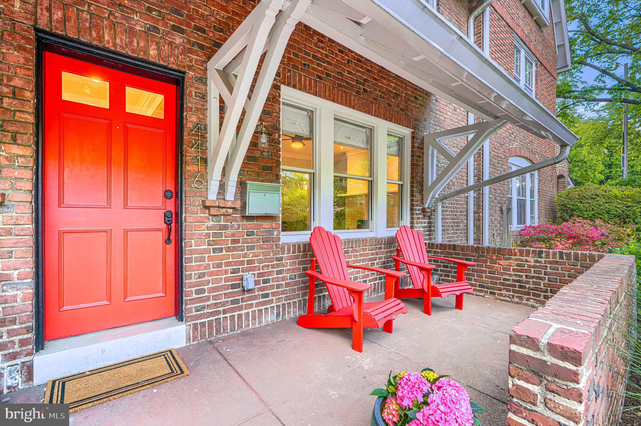 There are homes that feel good the moment you walk in. The kind where everything settles into place right away, and you can instantly picture your life unfolding there.

Built in 1916 and fully renovated, this three-story home blends timeless character with a fresh, thoughtful design. Original wood floors run throughout, adding warmth and continuity as light moves easily from one space to the next.

The living room sets the tone. A fireplace anchors the space, flanked by custom built-in bookshelves that feel like they’ve always been there. It’s easy to imagine them filled with well-loved books, collected pieces, and family photos, the kind of things that tell your story over time. It’s a room made for slow mornings, quiet evenings, and everything in between.

From there, the dining room sits just beyond, ready for long, lingering dinners where conversations stretch and no one is in a rush to leave the table. It connects seamlessly to the kitchen while still holding its own sense of place.

The kitchen opens beautifully from the dining room, creating a natural flow that makes everyday living and entertaining feel easy. Crisp and inviting, it features a gorgeous white palette, a generous peninsula, and an abundance of cabinetry that keeps everything effortlessly organized. It’s also outfitted with beautiful appliances, including a new stove, refrigerator, and dishwasher. A well-placed powder room completes the main level.

Upstairs, the second floor offers a sense of retreat. The primary suite is spacious and thoughtfully designed, with multiple closets and an en suite bath featuring an antique double vanity, a decadent soaking tub, and a large, beautifully finished shower. A second bedroom and an additional room, currently used as a home office, offer flexibility depending on how you want to live. A full hall bathroom serves this level, adding convenience for both everyday living and guests.

The third floor is where the home really surprises you. Vaulted ceilings create volume and light, while two additional bedrooms with built-ins offer both charm and function. The full bathroom is a true standout, with cathedral ceilings and a skylight that brings in soft, natural light throughout the day.

The fully finished lower level adds even more usable space, complete with a wet bar and a full bathroom. With its own separate rear entrance, this level also offers excellent potential as an in-law or au pair suite, creating flexibility for multigenerational living, long-term guests, or private accommodations. If a private guest space isn't on your wish list, the lower level easily transforms into a relaxed family room, home gym, creative studio, cozy media space, or whatever best fits your lifestyle.

The current owners have made thoughtful improvements you’ll appreciate every day. Closet organization systems have been added throughout, giving everything its place. Several windows have been replaced, improving both comfort and efficiency. The main water line has been replaced and an energy audit was completed, followed by targeted upgrades, along with a new water heater. The basement has also been professionally waterproofed, offering extra peace of mind.

Outside, the backyard is expansive and beautifully landscaped, with plenty of room to gather, garden, grill, and enjoy the seasons. The rear porch becomes an easy extension of the home, perfect for summer barbecues or a quiet cup of coffee in the morning, and a storage shed adds practical convenience. Just beyond, a one-car parking pad offers that extra bit of ease.

This is a home with soul. A place where the details feel considered, the spaces feel inviting, and the moments, big and small, have room to happen naturally.
