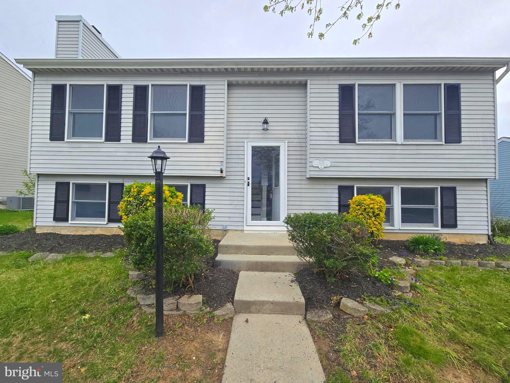 Stunning Modern Split-Level Home in Woodbridge Center

Welcome to this beautifully updated 3-bedroom, 2-bathroom split-level home nestled in the desirable Woodbridge Center community of Harford County. This home offers an inviting open-concept design, perfect for both comfortable living and entertaining.

The main level features spacious, full-size bedrooms, each with walk-in closets, providing ample storage. The upgraded gourmet kitchen boasts granite countertops and backsplash, complemented by a GE stainless steel appliance package, making meal preparation a delight. A beautifully updated bathroom completes the main level.

Downstairs, the expansive lower level offers a cozy family room with a brick wood-burning fireplace, ideal for gatherings on chilly evenings. This level also includes an additional bedroom and a full bathroom, perfect for guests or a private retreat.

Step outside onto the deck, which overlooks a huge backyard—ideal for grilling, outdoor dining, or simply relaxing in a serene setting. The walkout basement leads to superb landscaping, enhancing the curb appeal and outdoor enjoyment of this remarkable home.

Don't miss this opportunity to own a move-in-ready home in a prime location! Schedule your tour today!