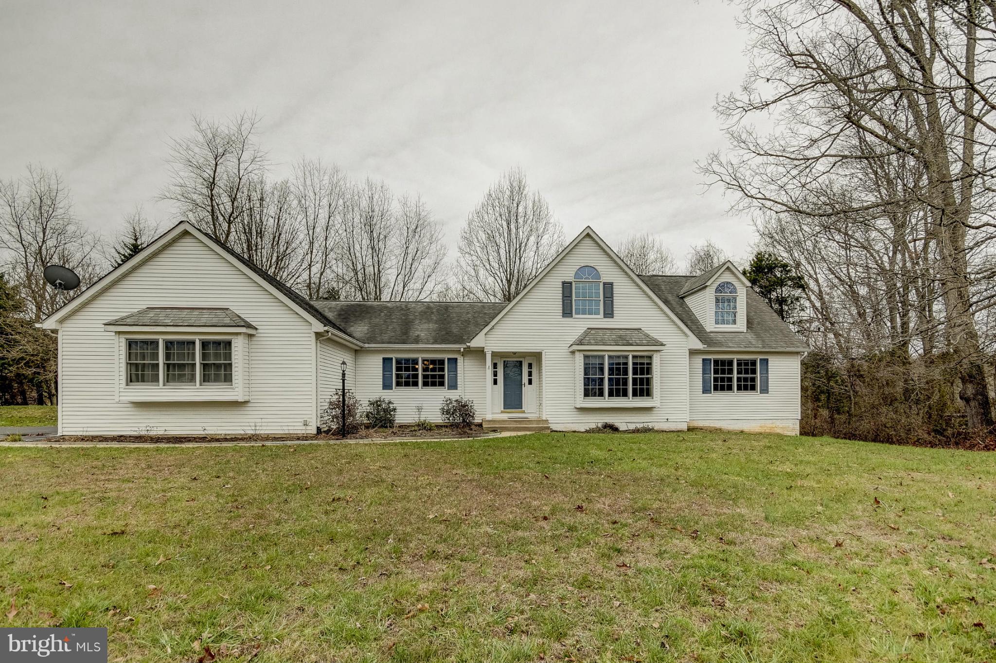 One Level Living on 1 Acre Lot with 3 Car Garage in South Wales! Spacious Floor Plan with 1st Floor Master Suite and 3 Additional Bedrooms Large Kitchen with Gas Cooktop,Granite Counters&Tons of Cabinetry Family Room with Gas Fireplace Luxury Master Suite with Huge Closet and Master Bathroom Upper Level with Office Loft Area& 2 Additional Bedrooms Screened Back Porch&Deck Unfinished Basement&More!