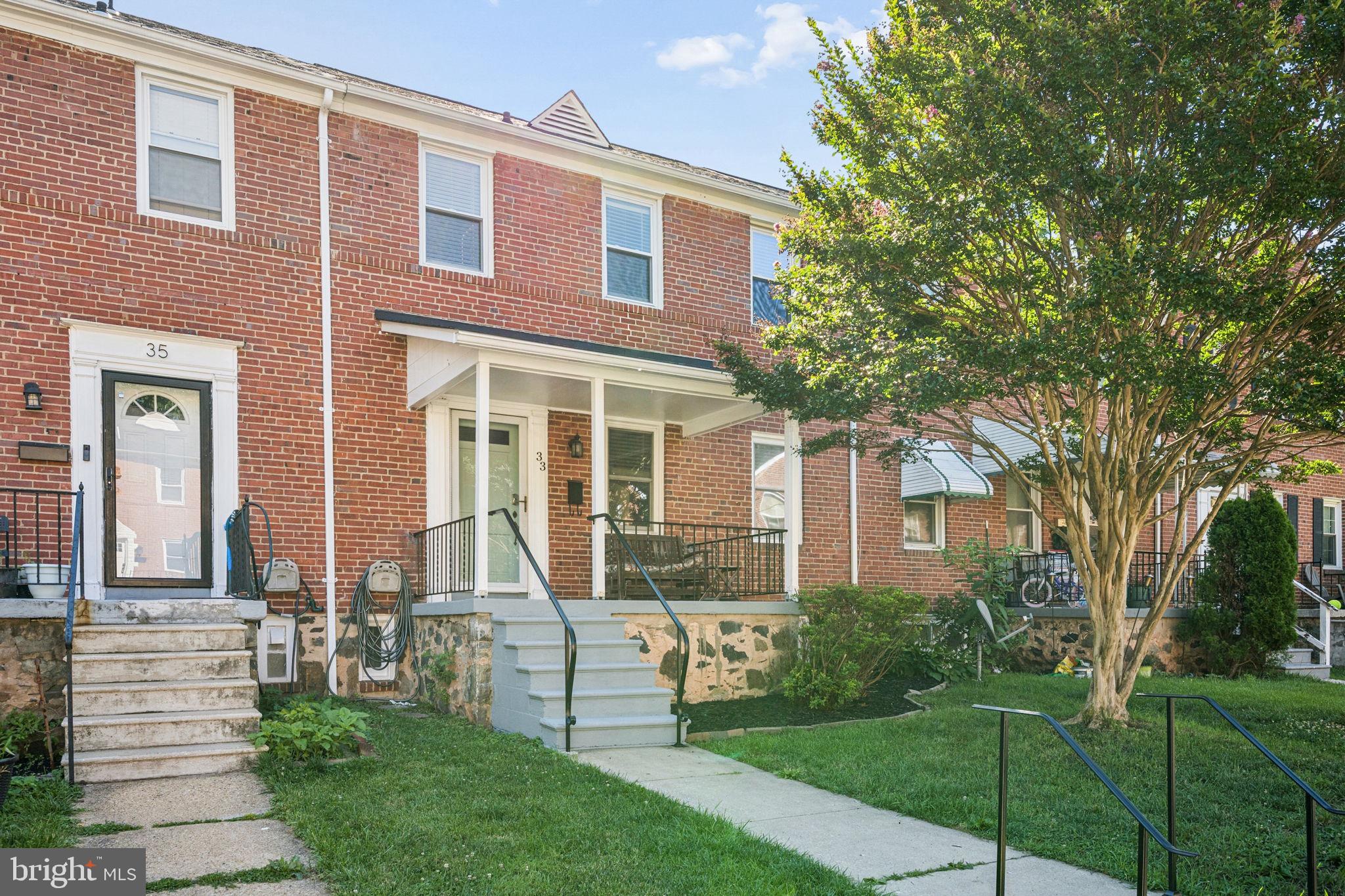 Welcome home to this beautifully maintained brick townhome where timeless character meets modern comfort! Bathed in natural light and showcasing gorgeous hardwood floors throughout the main and upper levels, this home offers warm, inviting spaces designed for everyday living. Elegant archways, spacious rooms, and tasteful updates create the perfect blend of classic charm and contemporary appeal.
The bright, updated kitchen features crisp white cabinetry, subway tile backsplash, generous counter space, and a layout that makes both everyday meals and entertaining effortless. Upstairs, you'll find three spacious bedrooms and an updated full bath with stylish finishes. The fully finished lower level expands your living space with an oversized family room ideal for movie nights, a home office, gym, or playroom, plus a convenient half bath, laundry area, and abundant storage. Step outside to enjoy your covered rear patio overlooking a fully fenced backyard—perfect for relaxing, grilling, or hosting friends. A private rear parking pad provides the convenience you've been looking for. Ideally situated just minutes from shopping, restaurants, parks, schools, and major commuter routes, this move-in ready home offers incredible value without sacrificing style or space. From the gleaming hardwood floors to the finished lower level and private parking, every detail makes this one a place you'll be proud to call home. Schedule your private tour today!