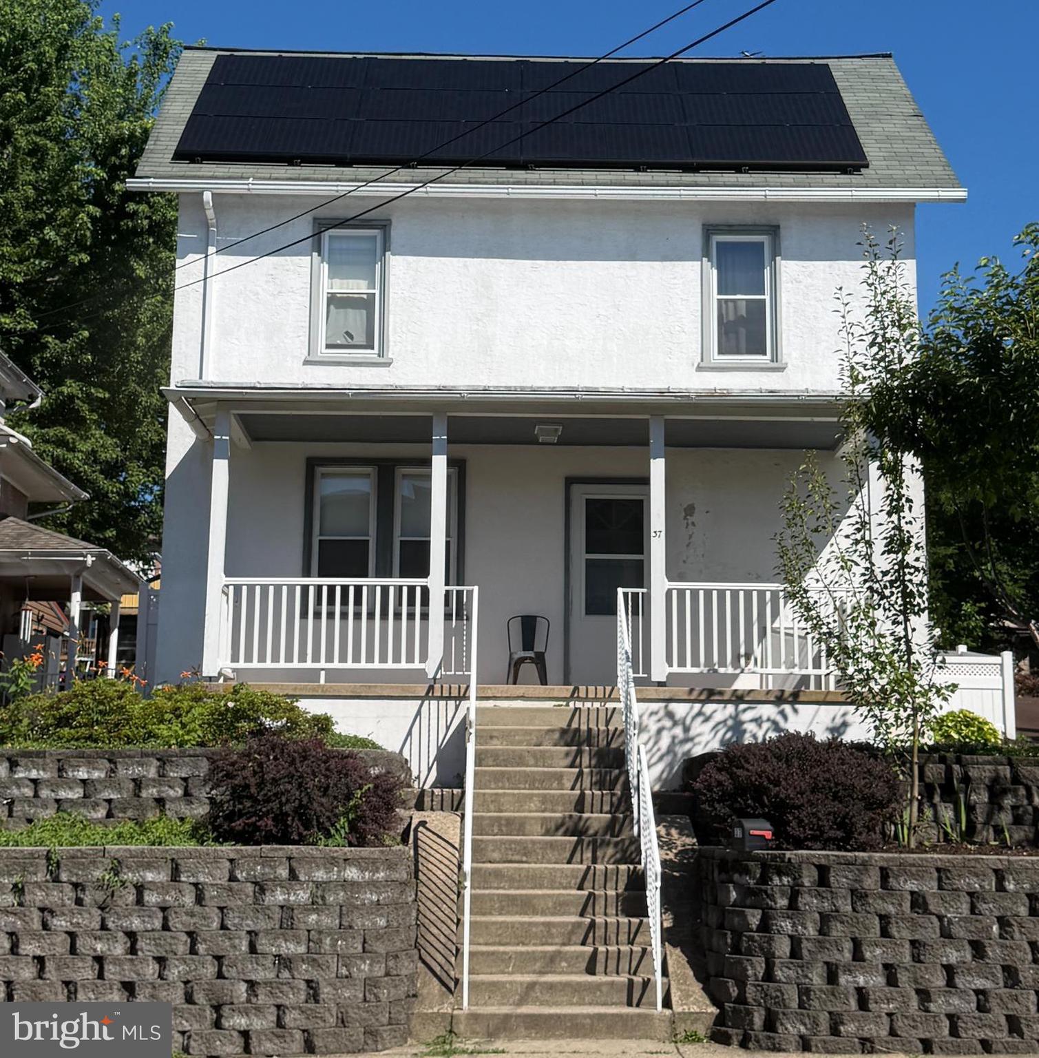 Welcome to 37 Green St—Where "Vintage Charm" Meets Your Next Great Income Empire!  Are you a savvy investor who calculates cash-on-cash returns, or a brilliant buyer who spots an absolute sleeper hit before the market catches on? Imagine owning a property that doesn’t just sit there looking historic, but actually *pays you to own it*. Feel that spark of excitement? Good. This Souderton borough home is the financial game-changer you’ve been waiting to experience.

Let’s be completely honest: this isn't your traditional, boring, soul-crushing cookie-cutter home. Built in 1900, it wears its character proudly. We call it "historic charm," which is real estate speak for "the original hardwood floors and moldings have survived multiple presidencies and questionable decor trends". Tucked away off the main strip, you are just a short, lazy stroll from the vibrant heart of Souderton Borough. Leave your keys on the counter and enjoy being completely walkable to local artisan shops, highly-rated restaurants, seasonal community events, and morning coffee spots. It gives you that perfect blend of quiet neighborhood living and ultimate downtown convenience.

Step inside the living room entry and notice the seamless flow with OG hardwood flooring. The large eat-in kitchen features electric cooking, tons of cabinets, and leads to a massive powder room that pulls double-duty as a main-floor laundry room. (Because nothing says "luxury multitasking" quite like washing your socks while flipping pancakes.) 

Upstairs, you will find two bedrooms and a full bath. Need a quiet hideaway, an office, or a place to store all your extra things? The walk-up, fully floored attic features two entire rooms and ample lighting. Down below, the semi-finished basement boasts a gorgeous brick fireplace. While it is currently non-operable, it can be easily hooked up to make it fully functional. Yes, actual operational warmth and cozy fireside vibes are just a quick weekend project away!

When you're ready to step outside, the exterior amenities offer the perfect backdrop for personal relaxation or lively entertaining. Start your mornings with a coffee on the covered front porch, soaking in the neighborhood vibe. Around back, a covered rear porch leads directly to a large, private patio area that is practically begging for summer barbecues and weekend gatherings. All of this transitions beautifully into a securely fenced-in rear yard, giving you a private oasis for outdoor activities or pets right in the borough.

But let's talk about the real magic: The Wealth-Building Trifecta.

Look closely at what this property actually gives you. Most borough homes offer you a cramped driveway if you're lucky. This property features an oversized, two-story, 2-to-3-car detached garage workshop equipped with electric, sewer, a fully floored second level! If you aren't a woodworker or a car enthusiast, picture renting out this massive workshop to a local contractor or hobbyist for effortless, hands-free monthly cash flow.

Wait, it gets better.  The price completely reflects an additional, separate vacant lot tucked right behind the garage, deeded separately as 44 Diamond Street (Parcel 21-00-02232-006)! While normal buyers just see an expanded rear yard, a truly sharp investor sees dollar signs. With borough approval, this lot is the ultimate canvas. You could expand the driveway for premium paid parking spaces, or maximize your income generation by erecting self-storage units to pull in monthly revenue!

Opportunities like this—where you can live in or rent the main house, lease a massive garage workshop, and develop a secondary lot for storage income—are rarer than a quiet day on the internet. Can you already feel the satisfaction of making a brilliant financial move? Don't let someone else steal your future cash flow. Schedule your tour today and come experience 37 Green Street in person!
