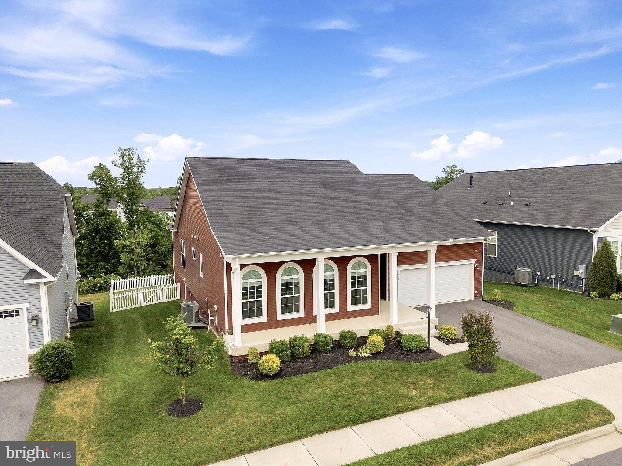 Some homes have features. This one has a feeling.

Set in the heart of the sought-after Snowden Bridge community, this Integrety Homes Lexington model is a contemporary ranch built for the way people actually live. The main level opens wide – kitchen, dining, and living flowing together under fresh paint and natural light, ready for your vision.

The primary suite commands the space it deserves: oversized, serene, and anchored by a bath stocked with every extra. A built-in sound system sets the mood. Central vacuum keeps it effortless. Downstairs, a full lower level with a multipurpose room, two bedrooms, full bath, and serious storage gives everyone room to spread out.

Step outside to stamped concrete, a covered porch, a fenced yard that meets the treeline – and the neighborhood walking path just beyond the gate. This is the one you’ll regret not seeing.