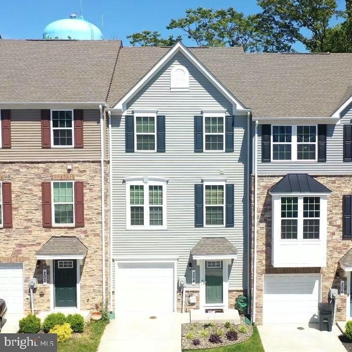 Nestled in the charming Anchor Point community in Indian Head, MD, this exquisite townhouse offers the perfect blend of modern comfort and timeless style. Built in 2021, this beautiful and EXCEPTIONALLY well maintained home features 1,720 square feet of thoughtfully designed living space, ideal for both everyday living and entertaining.

Step inside to discover an inviting open-concept floor plan filled with warmth, plenty of natural light with a natural flow. Plush carpeting, recessed lighting and contemporary finishes create a cozy, yet sophisticated atmosphere throughout the home. The heart of the home is the stunning kitchen, complete with a large and spacious center island, ENERGY STAR stainless steel appliances, built-in microwave, dishwasher, and high-efficiency refrigerator, this kitchen combines style and function. 

With three generously sized bedrooms and four bathrooms, including two full and two half baths, this home offers ample space for comfort and privacy. The serene primary suite provides the perfect retreat, while modern fixtures and thoughtful details enhance every room.

Additionally, the attached garage provides easy access for parking and ample storage, enhancing the overall functionality of the home. Outside, the low-maintenance exterior with vinyl siding, a fenced in backyard and a highly durable composite deck, the outside space definitely complements the inviting interior! Every detail has been carefully designed to deliver effortless living with modern appeal.

More than just a house, this is a place to truly call home. Experience the perfect balance of comfort, sophistication and convenience in one of Indian Head's most desirable communities. Don’t miss the opportunity to create lasting memories in this exceptional property!