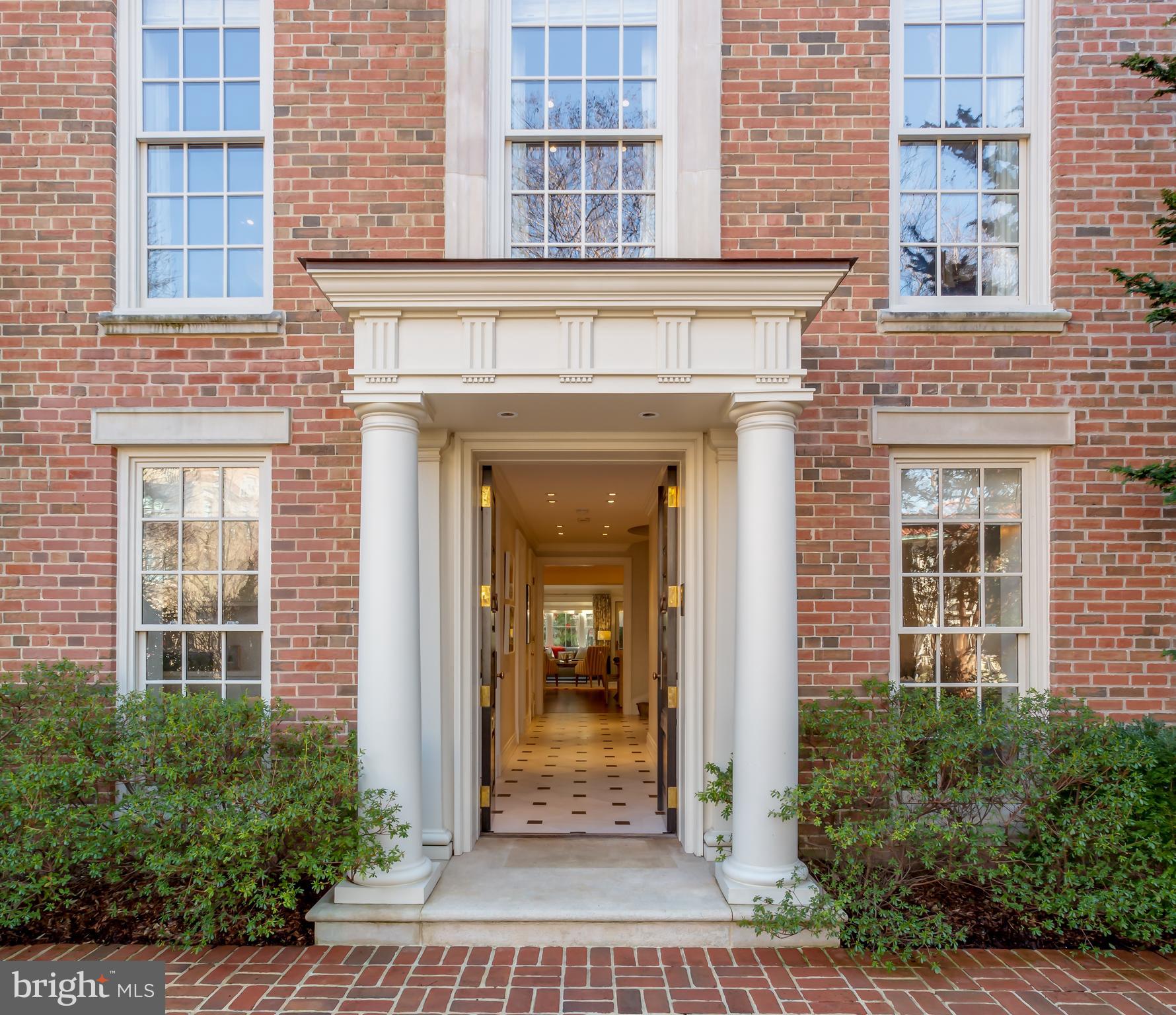 The best in casual family living as well as exquisite space for formal entertaining. Flawless jewel stripped to studs, expanded, and reimagined with limitless custom details and amenities in highest standard of building. Enviable warm and welcoming kitchen/family room with expansive views and direct access to rear garden. First level also includes marble floor center hall, curved staircase with circular skylight, four-level elevator, office, reception room, powder room, and laundry room. Elegance defines living room with sunroom and balcony, dining/library with butler pantry, and powder room. Top two levels include four en-suite bedrooms. Additional features - new extra-wide 2-car garage, exterior rear & front snow and ice melt, new centered front doors and portico, wine cellar, all new double-glazed full-height windows, one gas and two wood fireplaces, underground exterior utility wires, and so, so much more. Nothing has been overlooked.