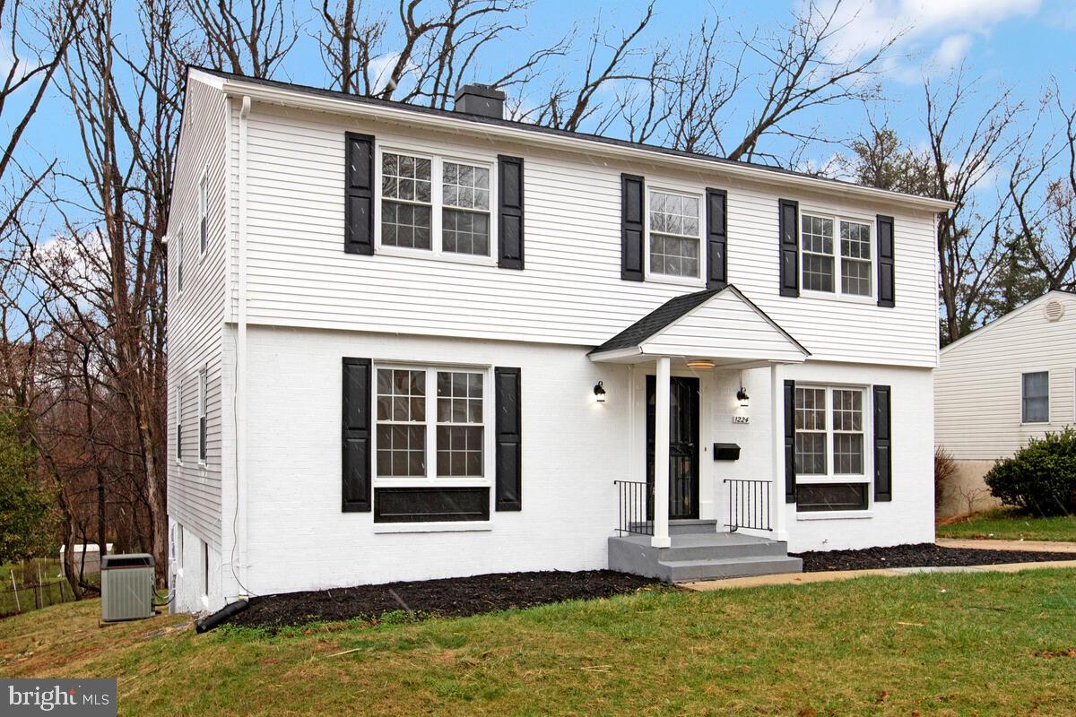 Welcome home to this beautifully updated Colonial, where modern upgrades and classic design come together seamlessly. The sun-filled main level showcases rich hardwood flooring, recessed lighting, and an ideal layout featuring formal living and dining spaces, along with a comfortable family room designed for both relaxation and entertaining. At the heart of the home, the renovated kitchen impresses with sleek quartz countertops, a designer tile backsplash, stainless steel appliances, ceramic tile flooring, a spacious pantry, and abundant cabinetry for all your storage needs. Retreat upstairs to the spacious primary suite, complete with dual closets and a tastefully renovated ensuite bath featuring a walk-in shower, quartz vanity, and contemporary finishes. Three additional generously sized bedrooms and a beautifully updated full hall bath provide ample space for family, guests, or a home office. The finished lower level expands your living space with a versatile recreation room, powder room, laundry area, storage space, and utility room. Thoughtful updates throughout the home include modern lighting, updated plumbing fixtures, and stylish finishes that make this property truly move-in ready. Conveniently located near shopping, dining, entertainment, parks, and major commuter routes, this exceptional home offers the perfect combination of comfort, style, and convenience. Don't miss your opportunity—schedule your private showing today!
