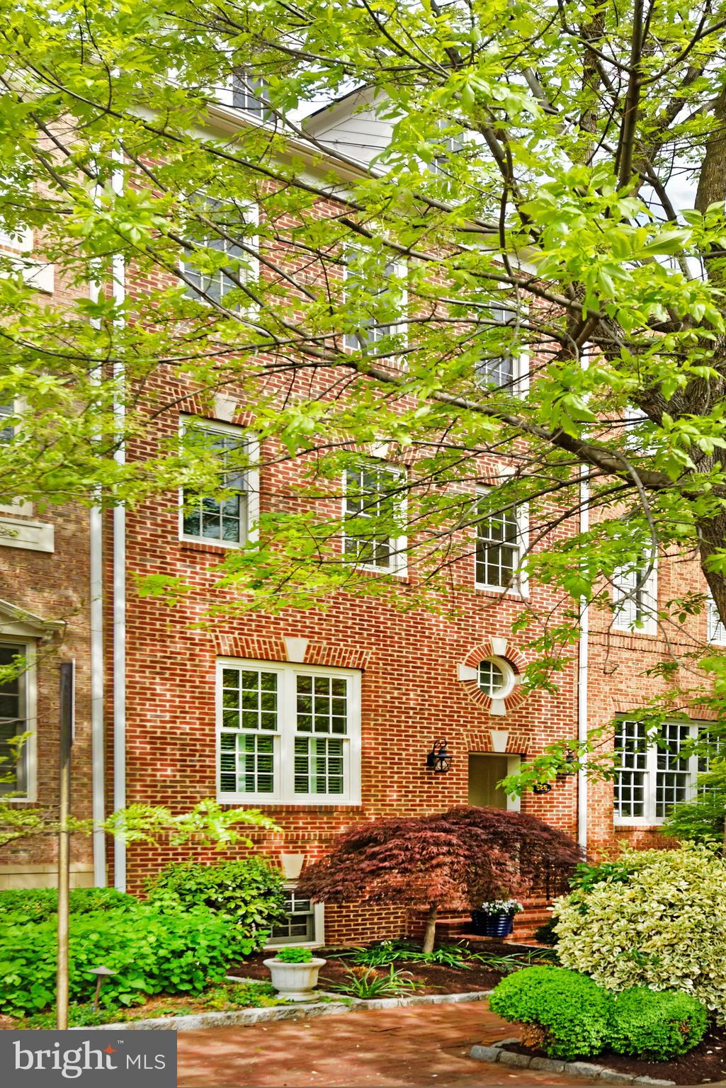 Sophisticated 4-bedroom, 4.5-renovated bath home offers the ultimate blend of luxury and comfort to elevate your living experience. Upon entering, an enviable living room with tall ceilings and hardwood floors provides the perfect ambiance for entertaining.  Elevate your culinary creations in the gourmet chef’s kitchen featuring top-of-the-line Thermador appliances and Sub-Zero refrigerator, pot filler, tall cabinetry and an expansive island with beverage cooler and seating. The adjoining sunny dining area and inviting family room features handsome millwork, tall windows and French doors bring the beauty of nature indoors. 
You’ll find a private sanctuary for relaxation and comfort in the spectacular primary suite featuring a tray ceiling, 2 walk-in closets, and a luxurious renovated bath.  With dual vanities, tall cabinets and an oversized seamless glass shower, the spa-like bath will cater to your needs with style. A light-filled office completes the second level.  The top floor provides an exercise space and two spacious ensuite bedrooms each with renovated baths. 
Cozy up by the fireplace in the lower-level recreation room.  It is the perfect casual escape for family time! A guest bedroom and full bath, and additional storage closet on this level offers everything you need for comfort and convenience. 
Step outside and unwind in style on the private patio that’s perfect for hosting a barbecue or relaxing with a book.  A spacious 2-car garage with attic storage completes this fine property.