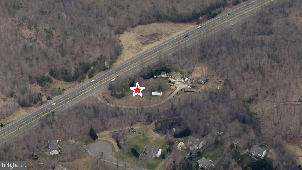 4.76 ACRES FRONTING HOADLY ROAD.  (Also known as 6616 Token Valley - Lot A).    Long Road frontage with treed border for privacy.  Approved 5 Bedroom Perc.