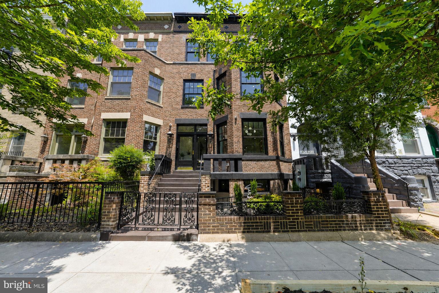 Some homes check every box. This one creates an entirely new standard.
Set across five beautifully designed levels, 1721 S Street NW offers a combination of features rarely found in one residence: a private elevator serving every level except the lower level, a spectacular rooftop deck with sweeping views of the Washington Monument, a fifth-floor club room designed for entertaining, the convenience of private parking for two vehicles, and the flexibility of a legal two-unit layout. All of this is just moments from Dupont Circle and Embassy Row.
Designed to embrace both indoor and outdoor living, the home offers five distinct outdoor spaces with exposures to both the north and south, allowing you to enjoy everything from quiet morning coffee in the sun to evening gatherings under the city lights. Whether you're looking for a private escape or the perfect setting to entertain, each outdoor space offers its own unique experience.
From the moment you step inside, the level of craftsmanship is unmistakable. White oak hardwood floors flow throughout the home, complemented by hand-selected marble, custom millwork, bespoke cabinetry, Waterworks fixtures, and designer lighting by Visual Comfort. Every finish has been thoughtfully selected to create a home that feels sophisticated, warm, and enduring.
At the heart of the home is a chef's kitchen appointed with premium Thermador appliances, generous prep space, and beautifully crafted cabinetry that blends form with function. Whether hosting an intimate dinner or a lively gathering, the kitchen is designed to be the natural gathering place.
The entire second level is dedicated to the primary suite, offering a level of privacy seldom found in city living. This floor is more than just a bedroom. It is a true retreat, complete with a spacious sleeping quarters, a separate home office, an inviting sitting area, and an elegant dressing suite featuring custom-built cabinetry. The spa-inspired bath, finished with exquisite marble and Waterworks fixtures, provides a calming place to begin and end each day.
The fifth-floor club room offers a sophisticated space to relax, entertain, or work from home before opening onto the rooftop terrace. Framed by sweeping views of the Washington Monument, the rooftop is a setting that transforms every occasion, from casual mornings with coffee to sunset cocktails and memorable evenings with friends.
The legal lower-level residence includes two bedrooms, a full kitchen, and its own living space, providing exceptional flexibility for multigenerational living, extended guests, an au pair, or rental income.
A private two-car garage offers a level of convenience that is exceptionally rare in this neighborhood, making everyday living and entertaining as effortless as the home itself.
Located in one of Washington's most sought-after neighborhoods, you're just a short stroll from Dupont Circle, Embassy Row, acclaimed restaurants, neighborhood cafés, parks, and cultural landmarks. It is a location that places the very best of Washington at your doorstep.
Beautifully designed, impeccably finished, and remarkably versatile, 1721 S Street NW is a residence that offers an exceptional lifestyle in one of the city's most prestigious addresses.