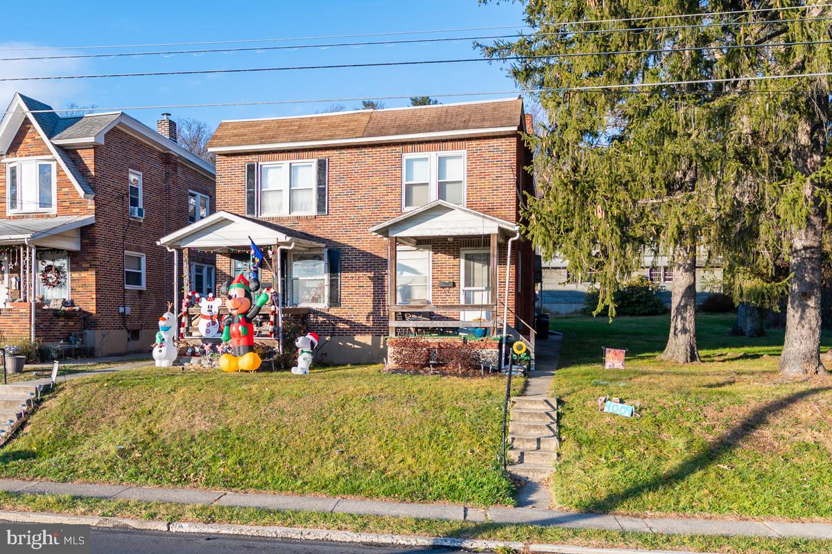 Nice 3 Bedroom 1 Bath brick semi in Exeter twp. Large living room, dining room and kitchen with plenty of cabinet space. Spacious master bedroom and two additional bedrooms and Full Bath on the second floor. There is a full basement and front and rear porches.   Also there is a large side yard that is part of this home offering great space for kids, pets and family fun. The location is great. Close to all shopping but situated in the quiet Borough of St. Lawrence. An added feature is all appliances remain and trash removal is included in the taxes.  The seller will have the frame garage at the rear of the property removed prior to settlement if a buyer so desires with an acceptable offer.