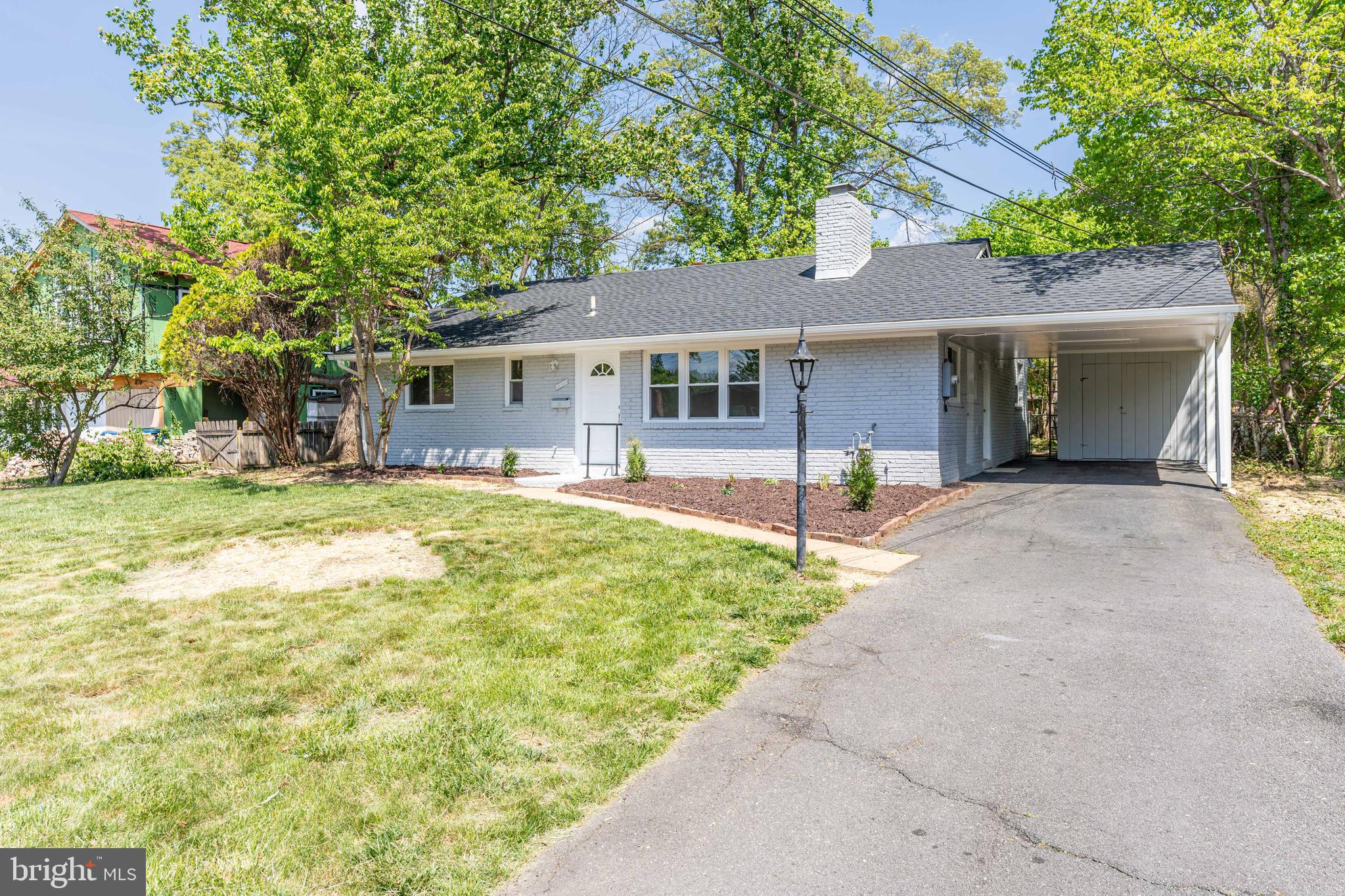 **1 LEVEL Living!** Welcome to 5506 JOPLIN ST, a charming ALL brick rambler  in the heart of North Springfield, just minutes from 495, commuter routes, shopping, parks, and dining. Set on a generous, sunny lot, this inviting home offers fantastic curb appeal, a wide front lawn, and the convenience of driveway parking right at your front door in a carport. Step inside to a bright living room featuring a painted brick fireplace, ALL NEW windows, and fresh neutral finishes that create a warm, inviting backdrop for everyday living. ALL NEW LVP flooring through out. The main living area flows into an eat‑in kitchen and dining space with recessed lighting and a sliding glass door that opens directly to the patio, making indoor‑outdoor entertaining effortless. The kitchen and dining area overlook the  backyard—perfect for play, pets, gardening, or future projects—with a fenced yard and storage shed completing the outdoor retreat.  NEW baths showcases large‑format tile surround, a sleek vanity, and contemporary fixtures for a clean, modern feel . ALL NEW SYSTEMS- KITCHEN , BATH, ROOF, HVAC, Flooring , Appliances, Laundry and List goes on..... Practical features include a dedicated laundry room with abundant cabinet storage and direct access to the rest of the home, helping keep daily life organized and clutter‑free. Outside, the rear patio and level yard offer plenty of room for grilling, a fire pit, or future deck—perfect for enjoying long summer evenings in an established Springfield neighborhood. All of this comes with access to highly rated Fairfax County schools and nearby community amenities, making 5506 JOPLIN ST a wonderful opportunity for first‑time buyers, downsizers, or anyone seeking a well‑located Springfield home with mid‑century charm, thoughtful updates, and room to make it their own.