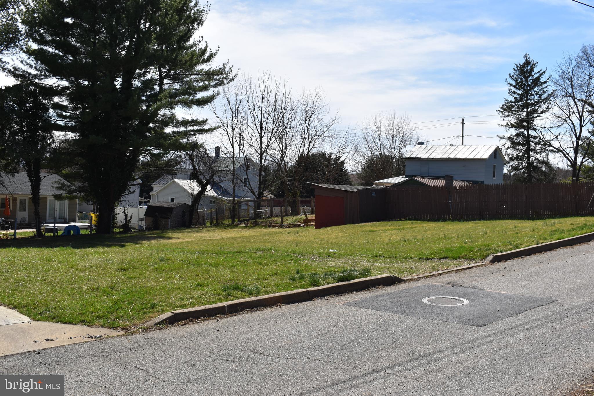 Two Lots included in sale.  With Charles Town approval, lot line separating lots can be switched to two Wall St. Fronting Lots to add value to the sale.  This site should accommodate a duplex or can be used as one residential lot for a larger home.  There is a shed row extension from a neighbors shed that encroaches on the property.  Inside of the shed, there is a block wall that separates the sheds between the properties.  Demo of the encroaching shed area should not be too difficult.

Lot#1 Blevins 19 03 0006 0018 0001
PCL B-Jackson 19 03 0006 0019 0001