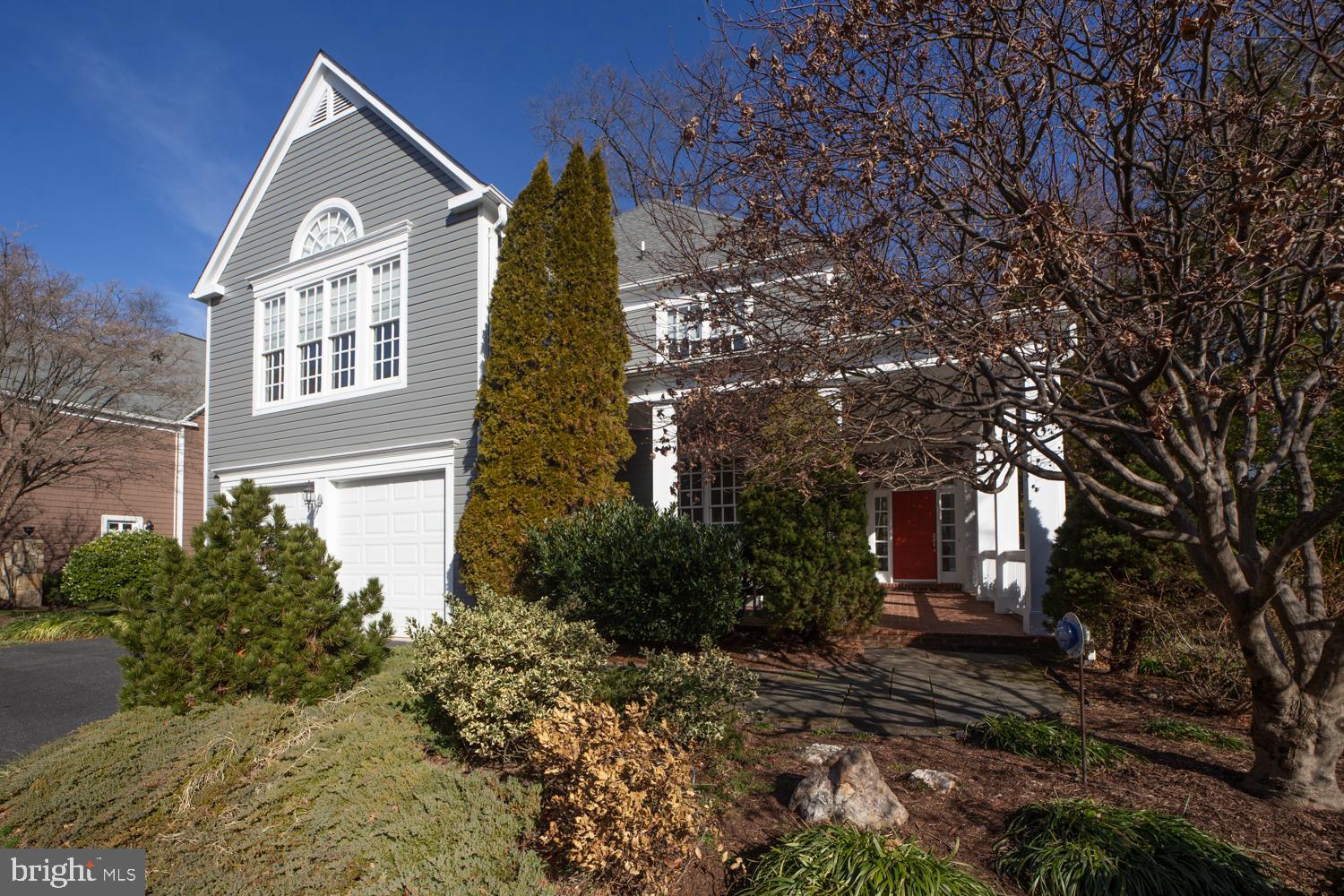 Offer due  Tuesday Feb 3 by noon.  This is not on Democracy BLVD; it is on Democracy LANE! This enclave of 16 newer homes (1991) in the Courts of Democracy is tucked away on a quiet cul-de-sac.  These are fee simple homes and there is no HOA.  This Nantucket style colonial has a welcoming front porch and opens to a light filled two story entry foyer that sets the tone for the drama and elegance of the rest of the home.  The living room with it vaulted ceiling, the oversized formal dining room and butler's pantry, and the family room give you space in all of the right places.  The recently renovated gourmet kitchen features granite, stainless appliances and ample counter and cabinet space.  And the breakfast area opens to the deck.  Upstairs is a dramatic primary suite with vaulted ceilings, two walk-in closets, and a spacious bath with two vanities and a separate tub and shower. There are 3 other bedrooms and two other baths on this level.  The daylight walk out lower level offers even more living space with a 5th bedroom a rec room with fireplace, a dance or exercise area and a bonus room as well as a full bath.  And did I mention the mudroom and 2 car garage on the main level?  Conveniently located near Cabin John Mall, Cabin John Park and Skating, Montgomery Mall and an abundance of swim tennis and recreational parks; the location is ideal.  This property offers the perfect combination of elegance, functionality and convenience.