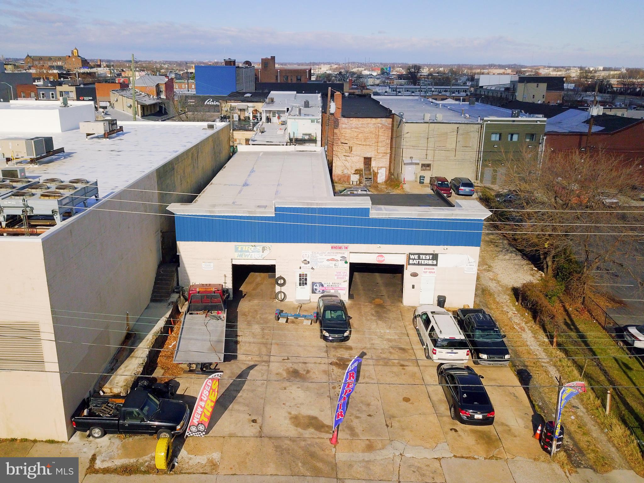 66'x149'HUGE commercial space. Current garage is over 4800 square feet with occupied at $4k / month.   Development opportunity for commercial space or residential.   Tons of new development in the area - this is a rare opportunity.