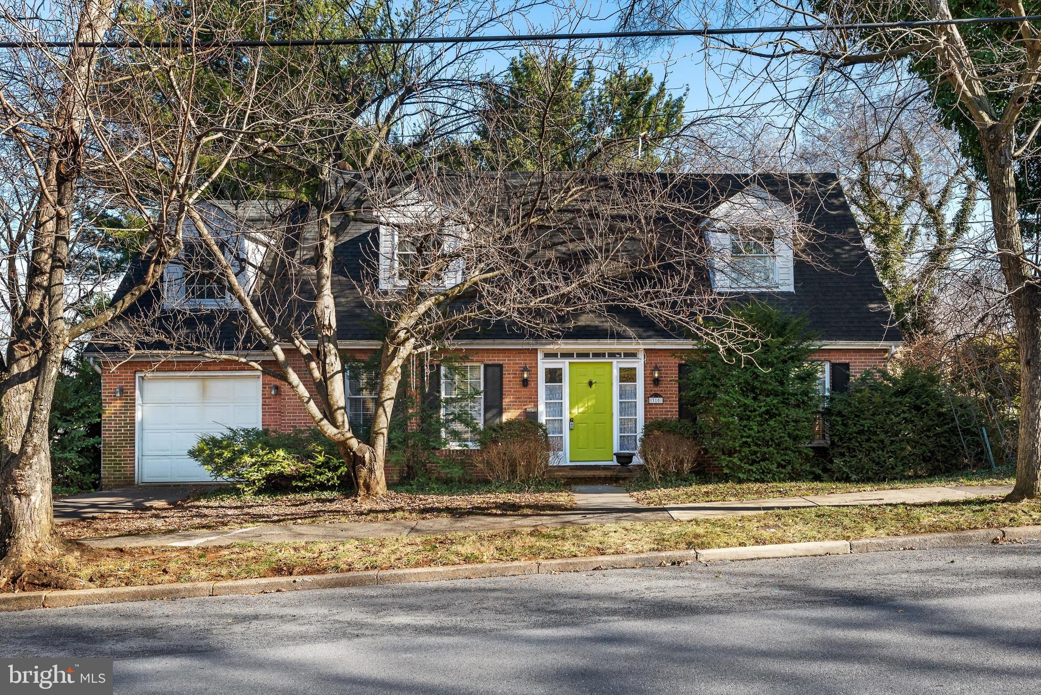 Handsome, Classic. Brick  Cape Cod whose charming exterior hides a spacious 4 bedroom interior with plenty of room for activities and entertaining.  The home enjoys an enviable, elevated lot above Old Towne Winchester complimented by mature trees that offer shade and privacy to the property.  Idyllic established neighborhood--walk to schools, shopping, services.