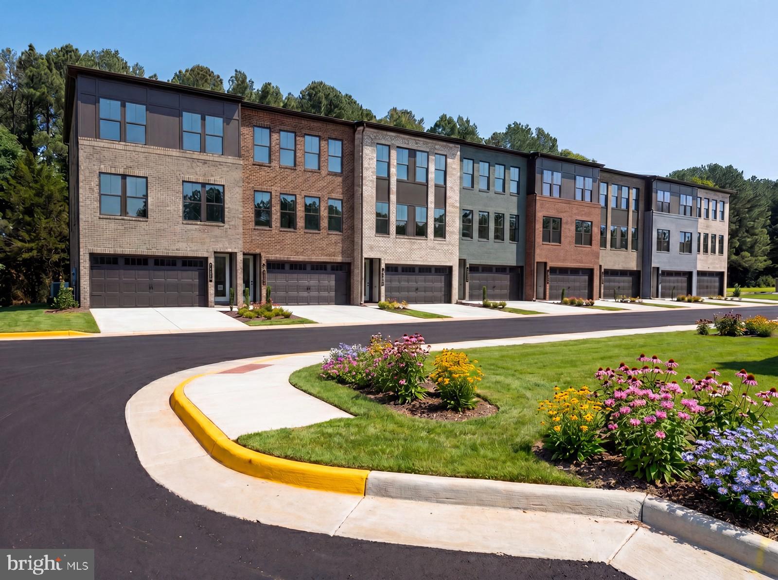 NVHomes proudly presents a brand-new collection of luxury townhomes, beautifully sited backing to forest and adjacent to 5,000 acres of parkland—all in a prime location just minutes from I-66.

This exquisite, spacious three-level townhome offers 4 bedrooms, 3 full baths, and 1 half bath, including a convenient entry-level bedroom—perfect for guests or a home office. The exterior showcases timeless brick and HardiPlank siding, along with a 2-car front-load garage and additional driveway parking.

The gourmet kitchen is a true centerpiece, featuring a large island, quartz countertops, full quartz backsplash, chimney-style hood, and elegant white shaker cabinetry with crown molding. Light-filled living spaces include large cased windows and 9-foot ceilings on all three levels, creating an open and airy feel throughout.

Enjoy a separate dining area that opens to a covered porch overlooking serene parkland—ideal for relaxing or entertaining. The upper level includes a convenient laundry area with washer and dryer included. The luxurious primary suite boasts two walk-in closets and a spa-inspired bath complete with a bench and niche.

Experience modern living surrounded by natural beauty—this home truly has it all.