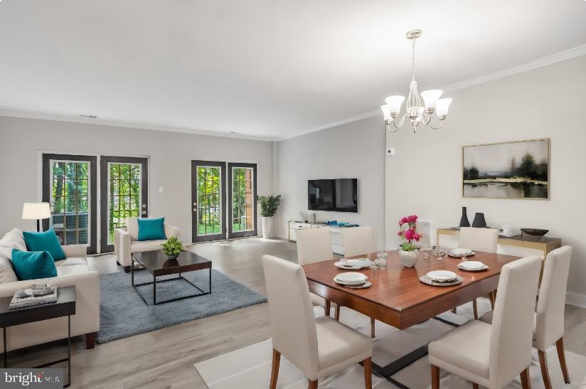 Experience elegance in this beautifully renovated 2-bedroom, 1.5-bath two-level condo in Aspen Hill. The property showcases an open floor plan flooded with natural light, complemented by a modern kitchen featuring new stainless steel appliances, pristine white cabinetry, and granite countertops. Step through the French doors to a charming patio, perfect for relaxation. Upstairs, the spacious bedrooms offer oversized closets and share a sophisticated Jack-and-Jill bath with a dual vanity. Enjoy community amenities including a swimming pool, jogging/walking paths, and tot lots/playgrounds. Ideally located near Glenmont Metro, bus services, and shopping centers, this condo perfectly combines style, comfort, and convenience.