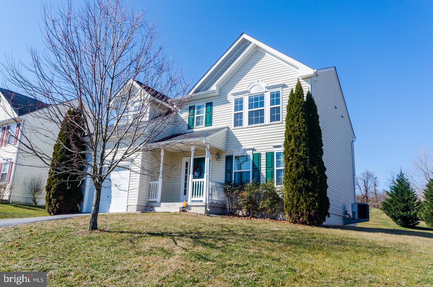 Beautiful 4 Bedroom 2.5 Bath Colonial Home in desirable neighborhood of Stonebrook Village. House sits on a low maintenance lot that is nice and nearly level! Large 1 car garage.  Large front porch and steps to lawn in the rear of the home for easy access for occupants of the 2 and 4-legged variety.  Driveway has room for at least 2 vehicles.  There are hardwood floors throughout the main level, with a nice large foyer.  Laundry includes washer and dryer and is conveniently located on the second floor with the four bedrooms.  Master Bedroom En Suite has separate tub and shower and a double sink vanity!  There is loads of storage in your convenient to access crawl space from inside the home. Hurry and schedule your showing today, before it's gone!