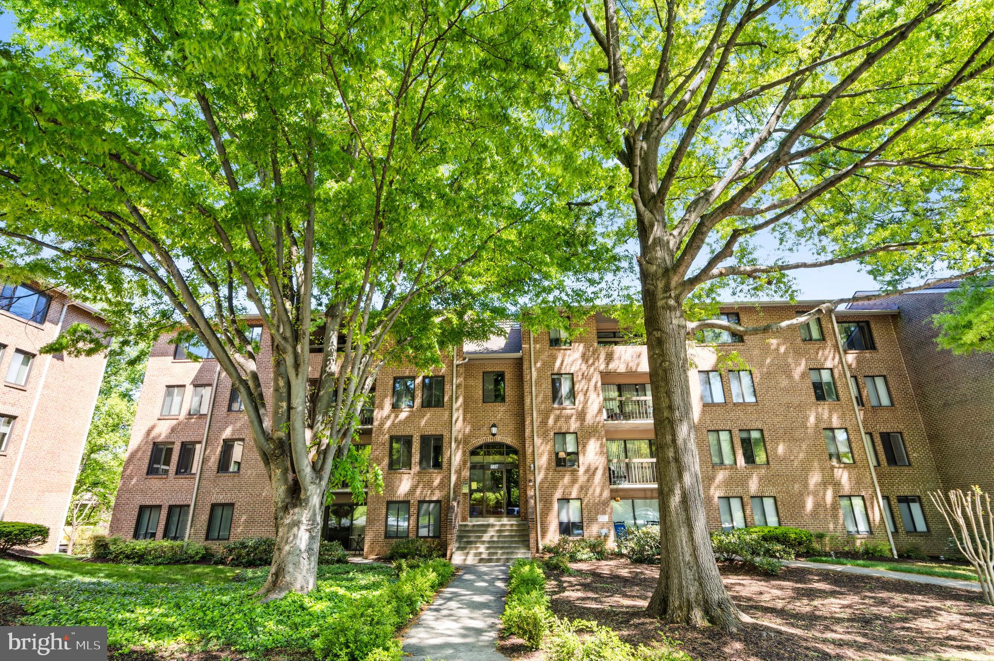 Welcome to 5817 Edson Lane #101, a beautifully maintained 2-bedroom, 2-bath condominium located in the desirable Georgetown Village community of North Bethesda, offering approximately 1,258 square feet of comfortable, light-filled living space with an open-concept layout that seamlessly connects the living and dining areas, perfect for both everyday living and entertaining; the well-equipped kitchen features ample cabinetry and workspace, while the spacious bedrooms—including a private primary suite—provide peaceful retreats with generous closet space, all enhanced by large windows that bring in abundant natural light; residents enjoy access to beautifully landscaped grounds and community amenities such as a swimming pool, tennis courts, and walking paths, creating a serene, park-like environment; ideally situated just minutes from Pike & Rose, this home offers convenient access to popular dining, shopping, entertainment, and everyday essentials like grocery stores and parks, while commuters will appreciate the close proximity to North Bethesda Metro, I-270, and I-495, providing easy connectivity to downtown Bethesda, NIH, and Washington, D.C., making this an exceptional opportunity for those seeking comfort, convenience, and a vibrant lifestyle in a prime location.