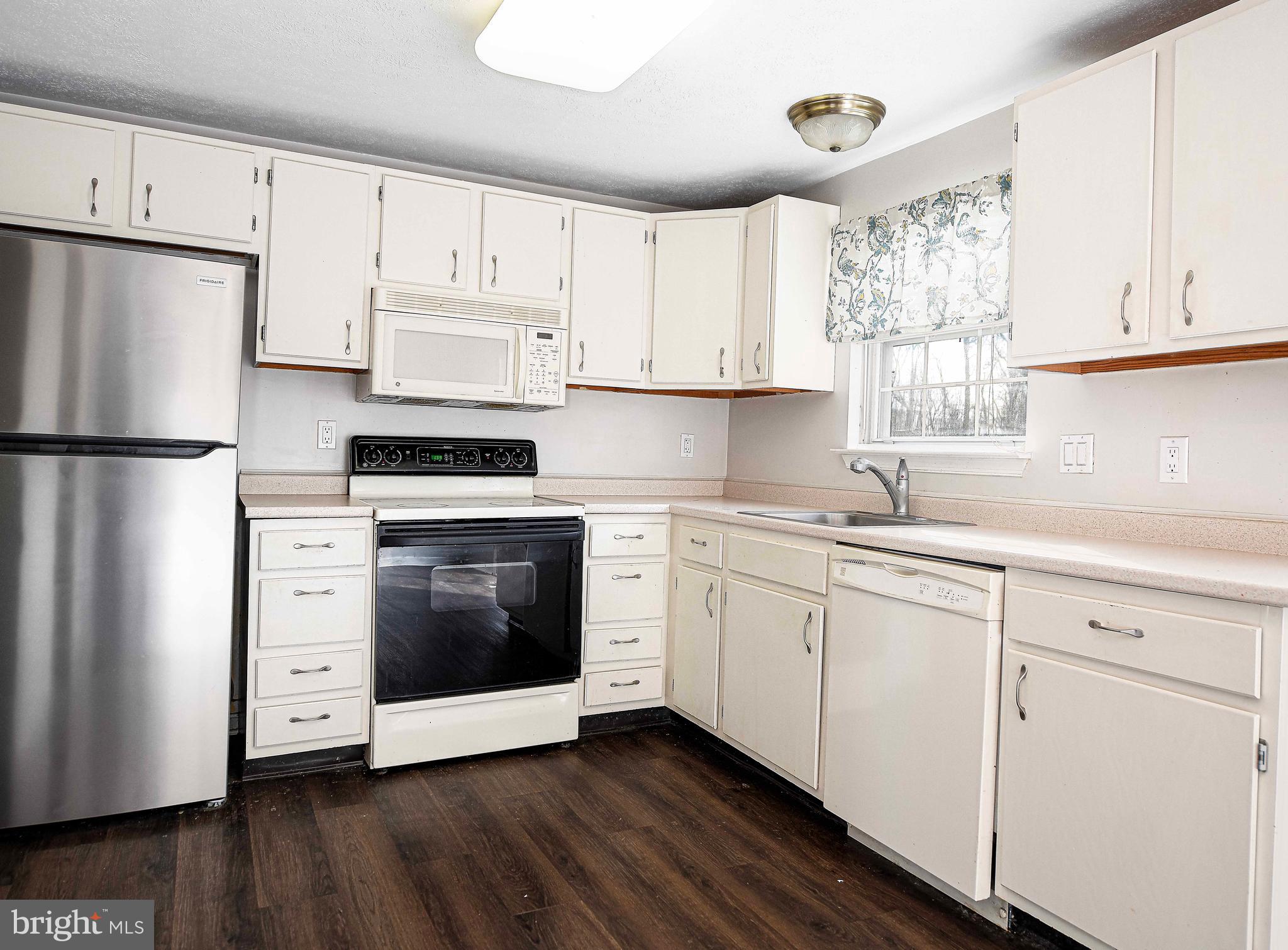 Charming townhome in the heart of Abingdon! Enjoy relaxing on the covered front porch or unwinding on the main-level deck overlooking a wooded backdrop that offers added privacy. This home features 2 bedrooms and 3 full bathrooms, with durable LVP flooring throughout the main and lower levels. The updated kitchen is both stylish and functional, while the wood-burning fireplace adds cozy character to the living space. The finished lower level includes a spacious rec room and a full bath—perfect for entertaining or additional living space. Outside, the fenced rear yard provides plenty of shade for outdoor enjoyment. Major updates include a new roof in 2021. Conveniently located near I-95, shopping, and a wide variety of restaurants, this home offers comfort, privacy, and easy access to everything you need.
Property sold as-is and is in good condition.

This is a short sale property. Please consult listing agent or your agent for details on how a short sale works.