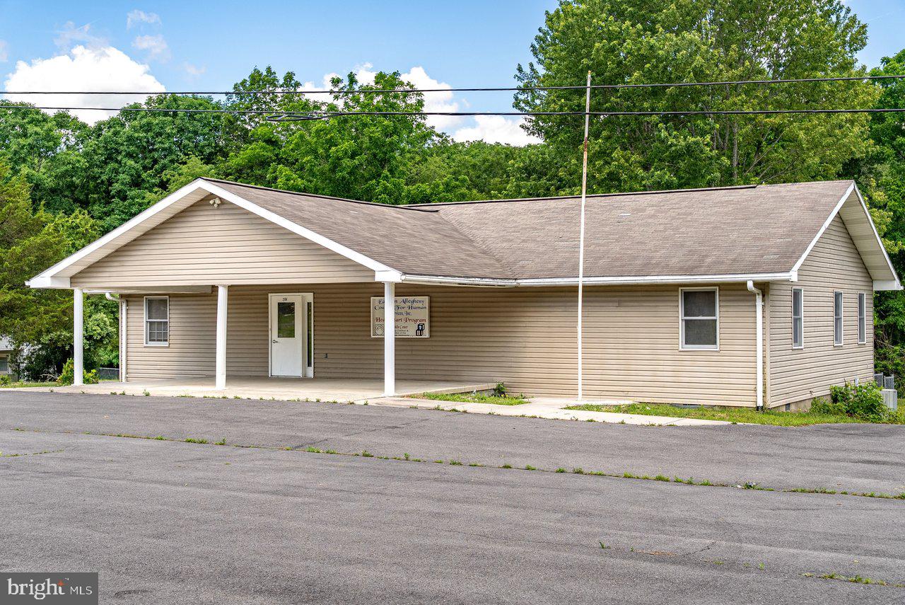 BRING YOUR PLANS & IDEAS. MAKE YOUR DREAM A REALITY! Great location for home or business. Building was previously a school but is now ready to be used as a home if you desire. With one full bathroom, three half baths, three nonconforming bedrooms (no closets) or potential office spaces, a functional kitchen, fenced yard, and ample parking lot you can comfortably live here or run your business. Possible business ideas include: hair salon, spa, daycare, venue, office space, catering, cafe/coffee shop, and so many other endless possibilities.
