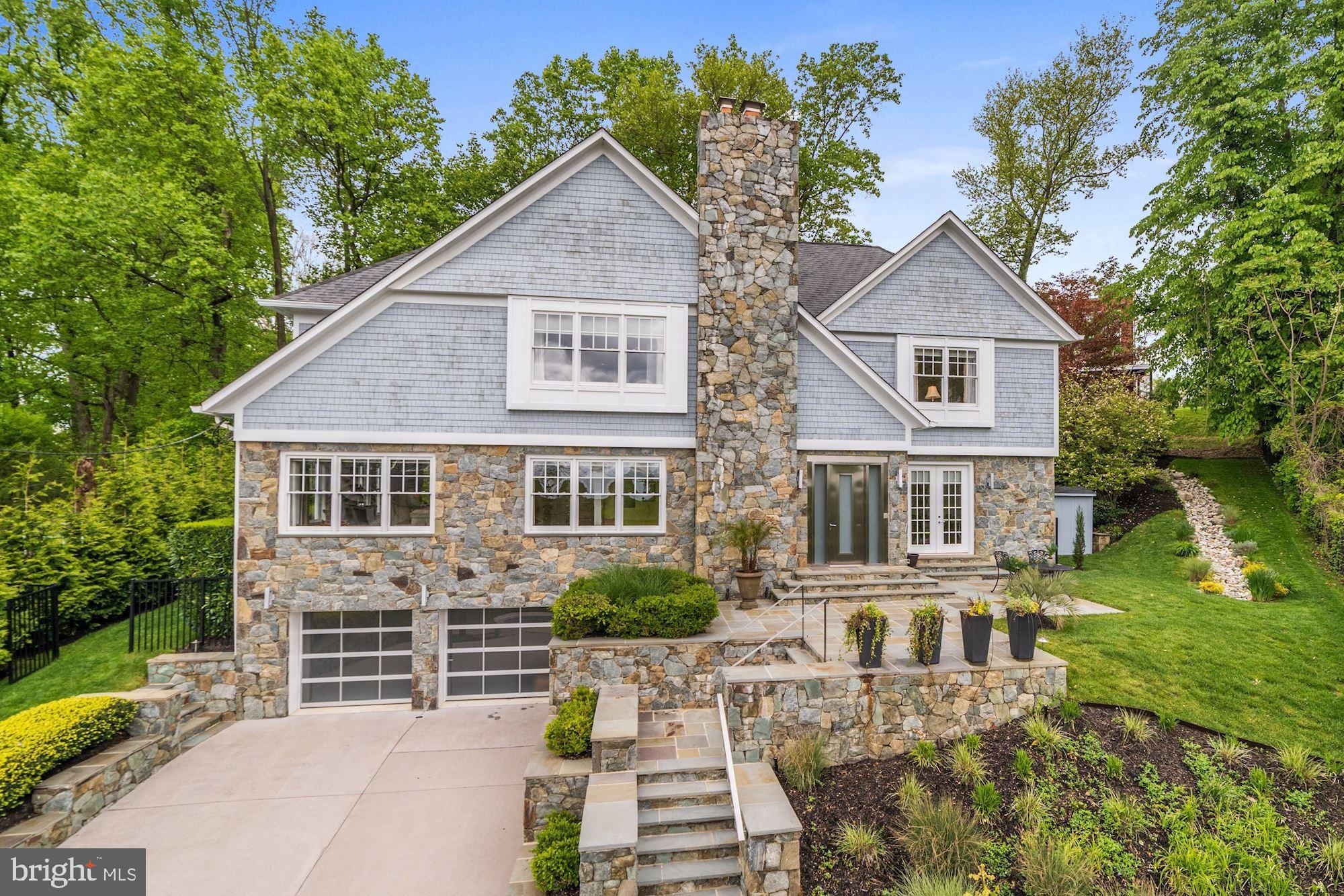 BETHESDA INSIDE THE BELTWAY - perched atop a quiet cul-de-sac less than 1-mile to the DC line! Nearly 6,000 SF of finished luxury includes 5 Bedrooms Suites each with their own Bathrooms, Top-of-the-line contemporary kitchen with custom cabinetry, integrated & stainless steel appliances including gas cooktop, lower level kitchenette, and fabulous Owner Suite with vaulted ceiling, rolling southern vistas, wet bar w/ Miele espresso machine, gas fireplace, balcony, and uber-lux bathroom with heated floor, double vanity, stainless steel tub, and large separate spa shower.  Outside, the main level rear garden features wraparound flagstone patio with stainless steel hot tub, sauna, and wonderful indoor-outdoor entertaining space.