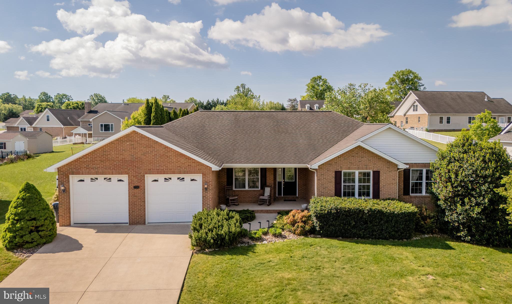 Incredibly spacious, all-brick home with everything you need on one level PLUS a full basement! Main level includes formal dining room with chair rail and hardwood floor, 17x20 living room with gas fireplace, eat-in kitchen with stainless appliances, 8x9 laundry room with utility sink, half bath, and three bedrooms and two full bathrooms, including owner's suite with 15x17 bedroom, walk-in closet, jetted tub. Basement level has a large storage area, and an additional 1,445 sq. ft. of finished space, with 4th bedroom, 3rd full bath, and an enormous rec room! Two-bay garage includes additional 10x21 area for workshop or storage, as well as a ramp for wheelchair accessibility. Outdoor areas include 6x18 covered front porch, 16x26 rear patio, fully fenced back yard, 10x16 storage shed, and something you won't see very often in a residential neighborhood -- a 14x20 pavilion with metal roof, electric outlets, concrete pad, and two ceiling fans! HVAC system replaced in 2023.