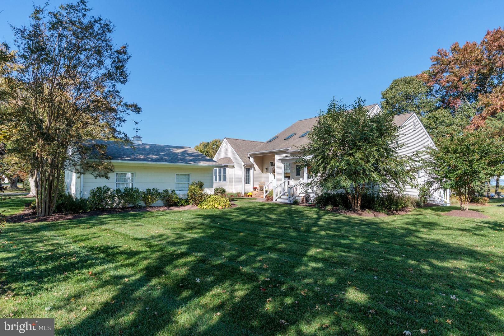 Welcome to waterfront living in the heart of St. Michaels. This fully renovated 3-bedroom plus office, 2.5-bath home offers a thoughtful blend of modern updates and coastal charm, all set against expansive views of the Miles River. The first-floor primary suite is a true retreat, featuring a custom California Closet system and a beautifully updated bath with a walk-in shower, freestanding tub, and double vanity. Upstairs, enjoy a private balcony with elevated water views, while the rear composite deck provides the perfect setting for everyday living and entertaining, all overlooking the Miles River. The outdoor space is designed to impress, complete with hardscaped pavers, a gas-connected grill, pizza oven, and propane fire table. A private dock offers direct water access, ideal for boating, kayaking, or simply enjoying the waterfront lifestyle. Additional highlights include new LVP flooring, a new furnace, encapsulated crawlspace, and a newly installed irrigation system to maintain the home’s mature landscaping and hydrangeas. A detached garage and access to a nearby community dock within walking distance further enhance the lifestyle this property offers. Tax record indicates wrong square footage, actual square footage of the home is 3,076 square feet of living space. *** Settlement cannot occur before September 10th, 2026***