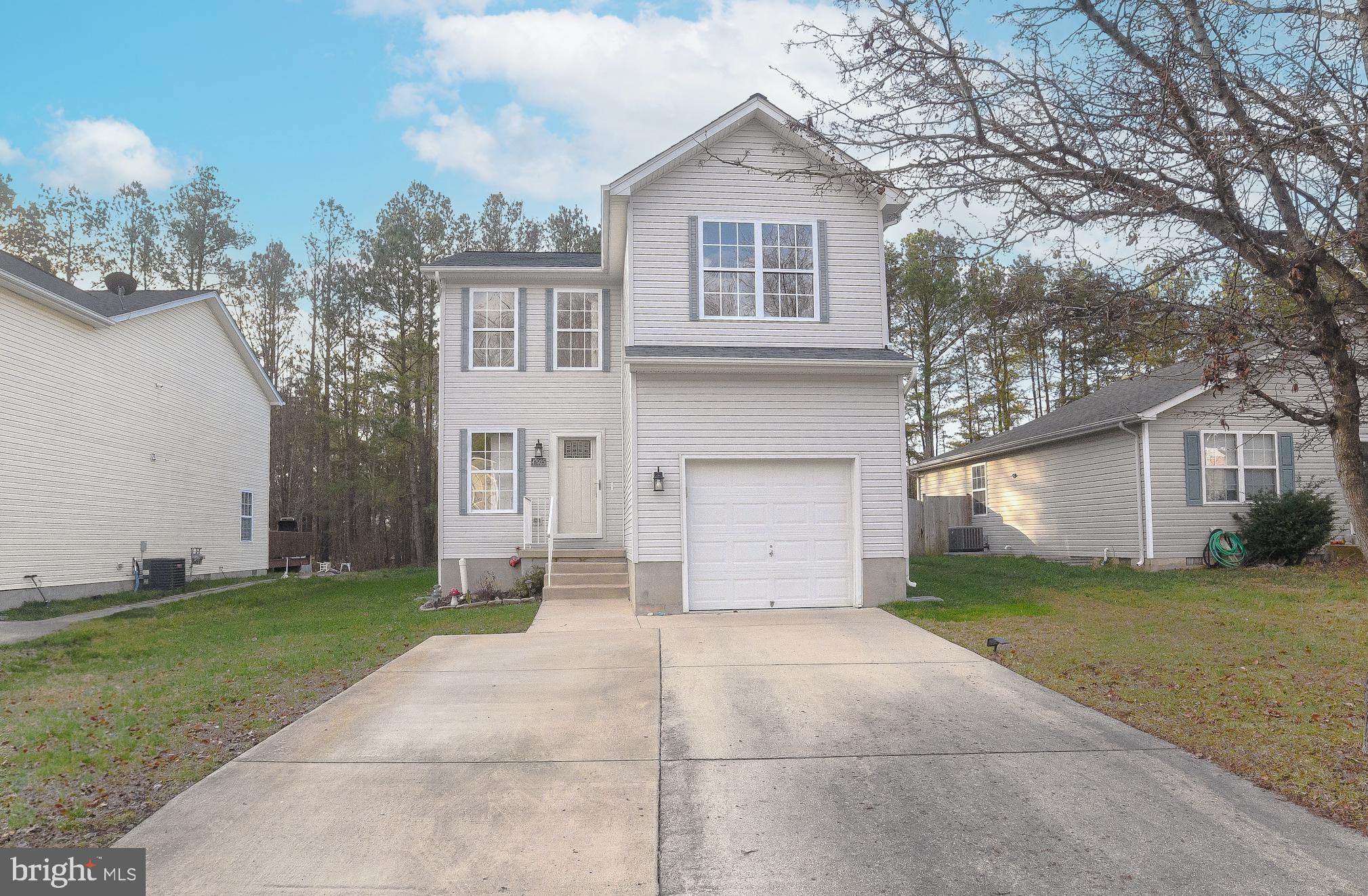 Classic 3-bed 2.5 bath Colonial, located in a small neighborhood just outside of NAS Pax Gate 3! Imagine no time lost commuting to work! This pleasant home has an open floor plan, abundant natural lighting, an attached garage, and an upgraded composite back deck. The spacious primary bedroom suite features a private bathroom with soaking tub and a separate shower stall, and a large walk-in closet. A convenient laundry space is in the upper level hallway. Two secondary bedrooms are perfectly sized for guests and other family members, with a shared hall bath. Easy to maintain home, inside and out! The level yard is easy to care for, with plenty of room to play, and sunny areas to garden. The driveway has been widened to provide convenient parking. The roof was replaced in 2022, water heater in 2021. The property backs to trees, and the shed conveys. Great opportunity to have a home of your own! Many nearby amenities, just off 235. Easy commute to Webster Field, St. Mary's City. Nearby farmers market!